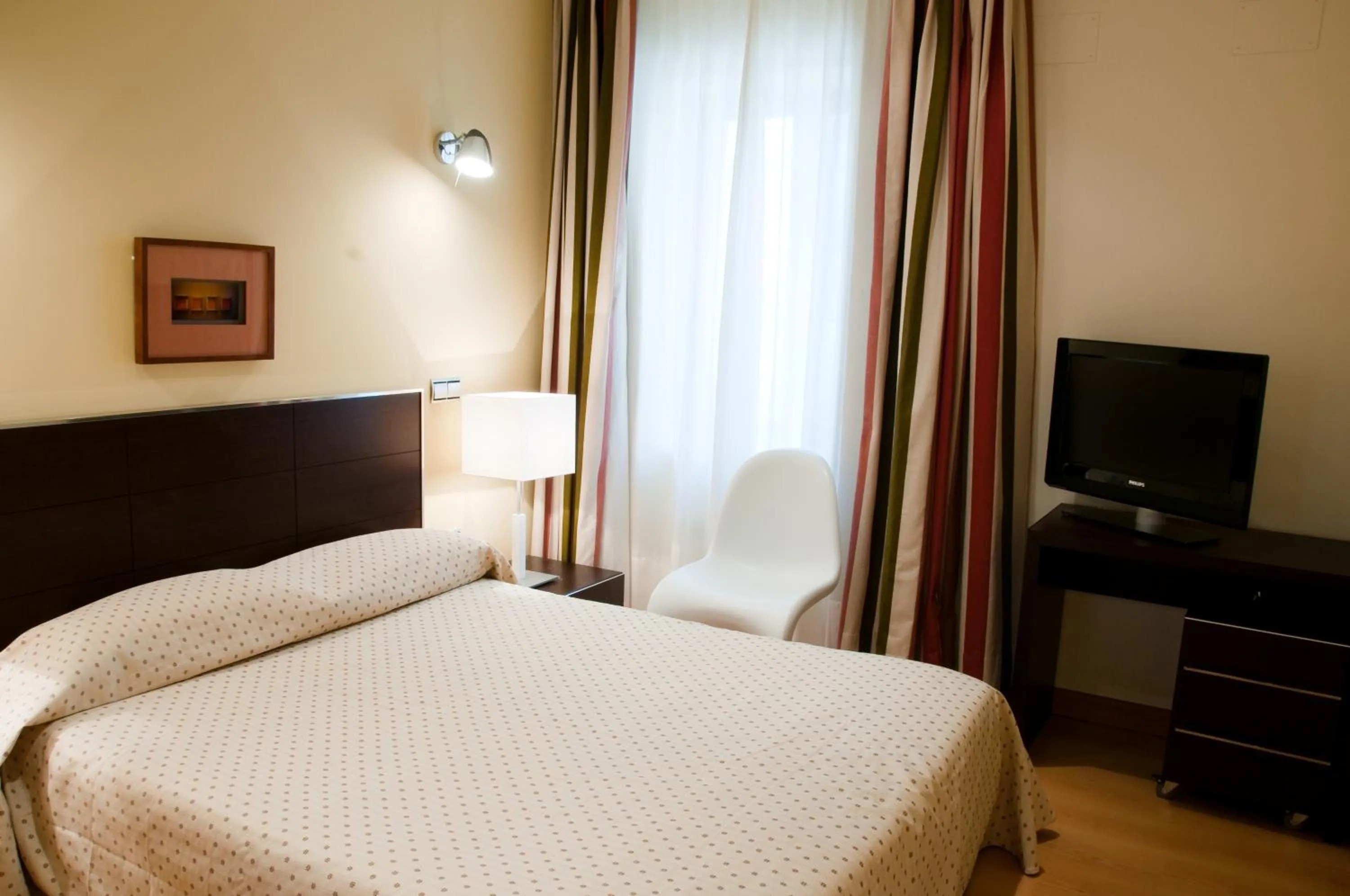 Photo of the whole room, Bed in Apartamentos María Luisa