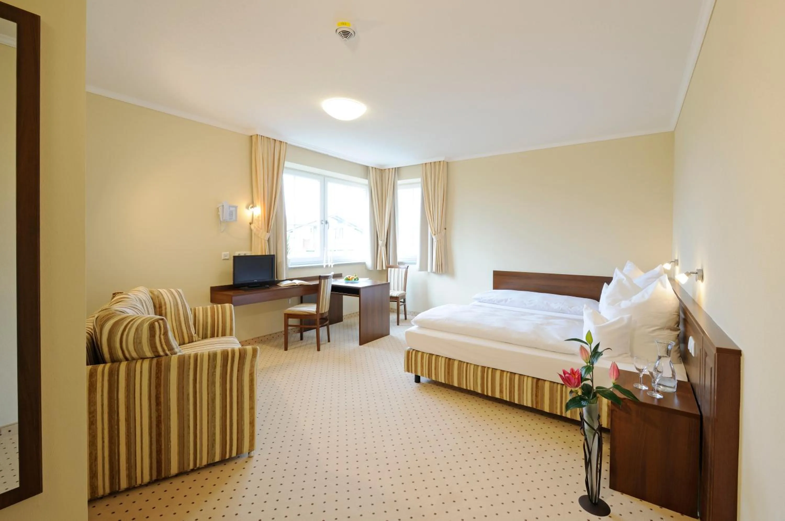 Living room, Bed in Hotel Inspiration Garni