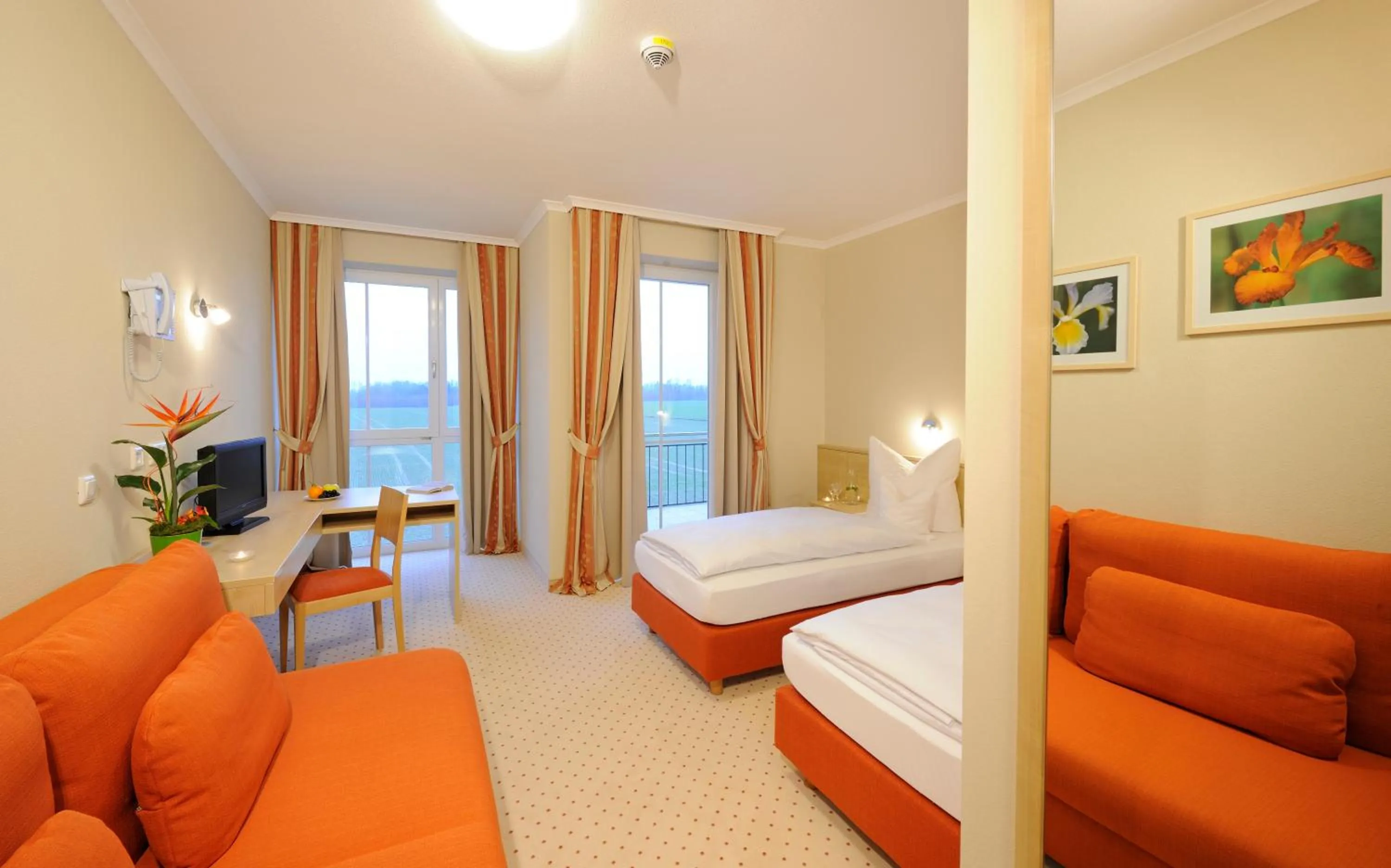 Living room, Bed in Hotel Inspiration Garni