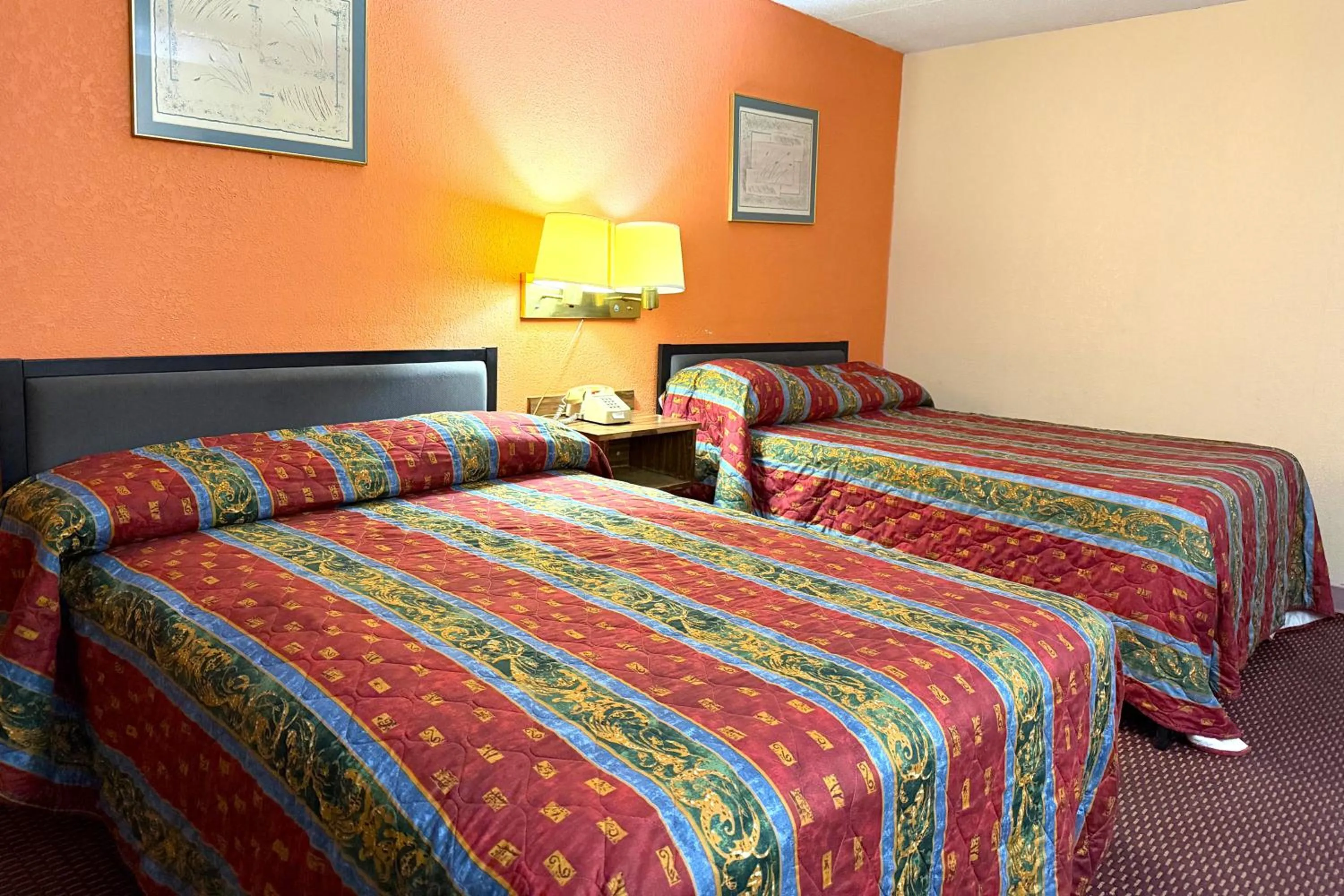Bedroom, Bed in Red Carpet Inn & Suites Lima -Listing Partner