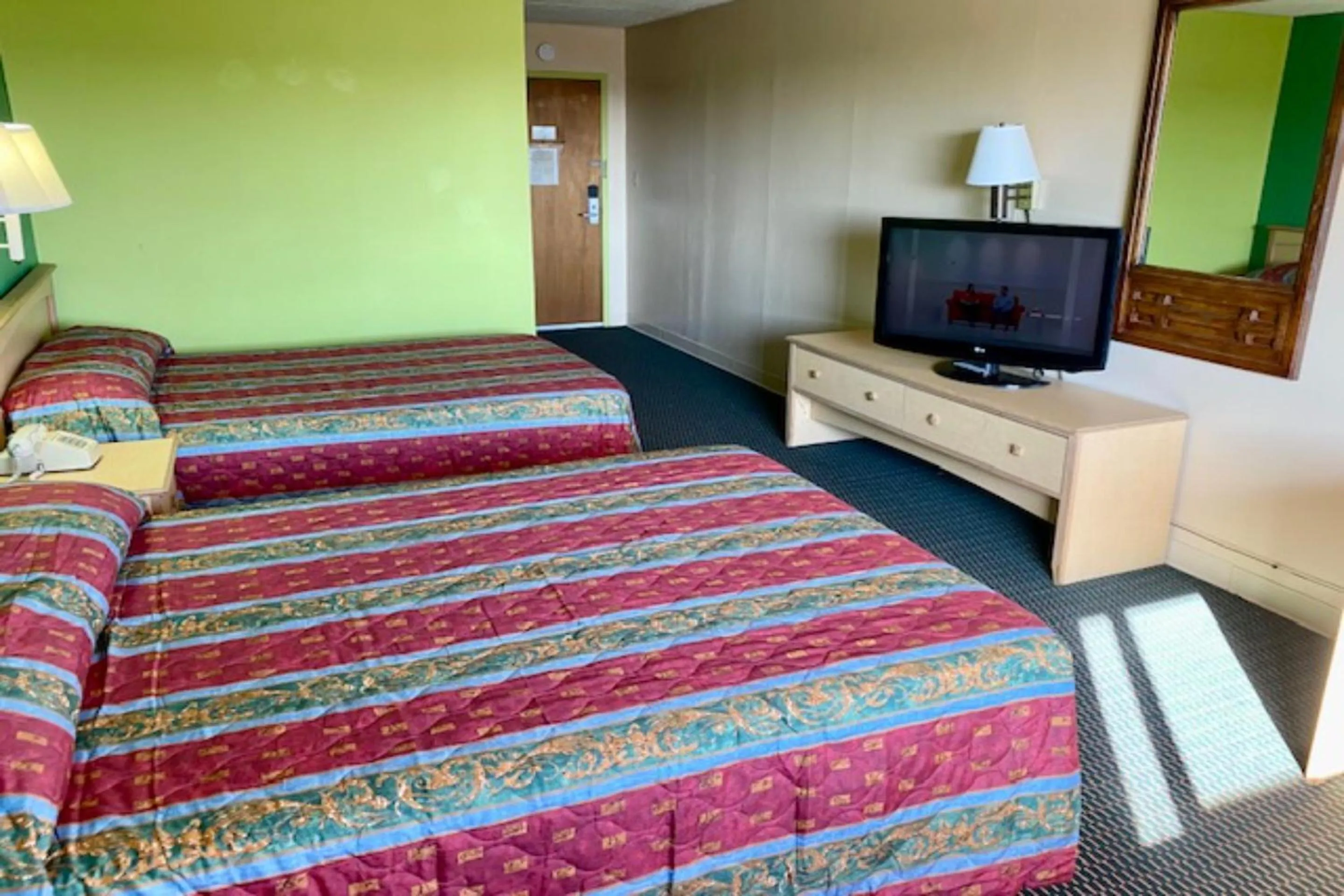 Bedroom, Bed in Red Carpet Inn & Suites Lima -Listing Partner