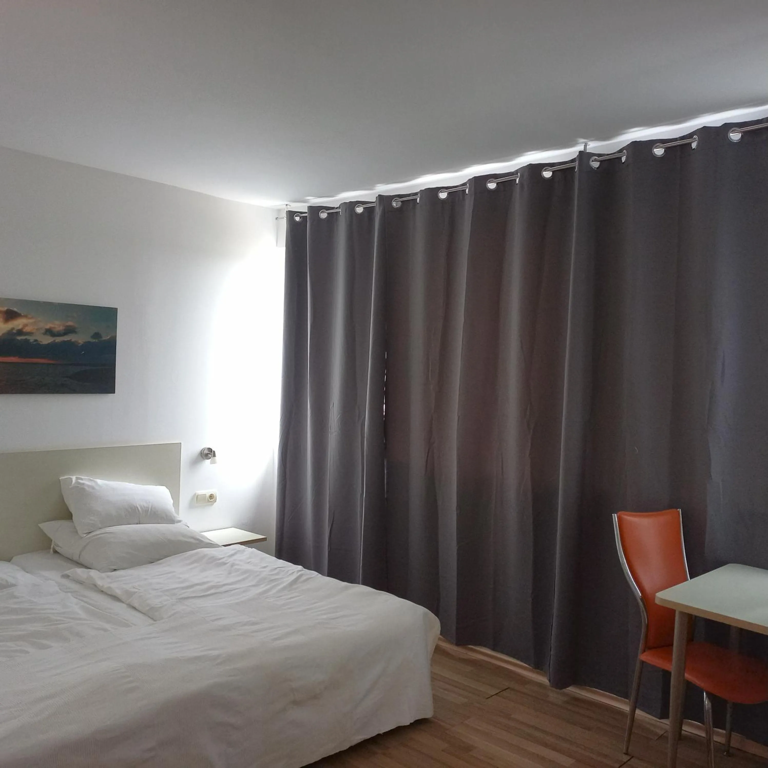 Bed in Aparthotel Romance