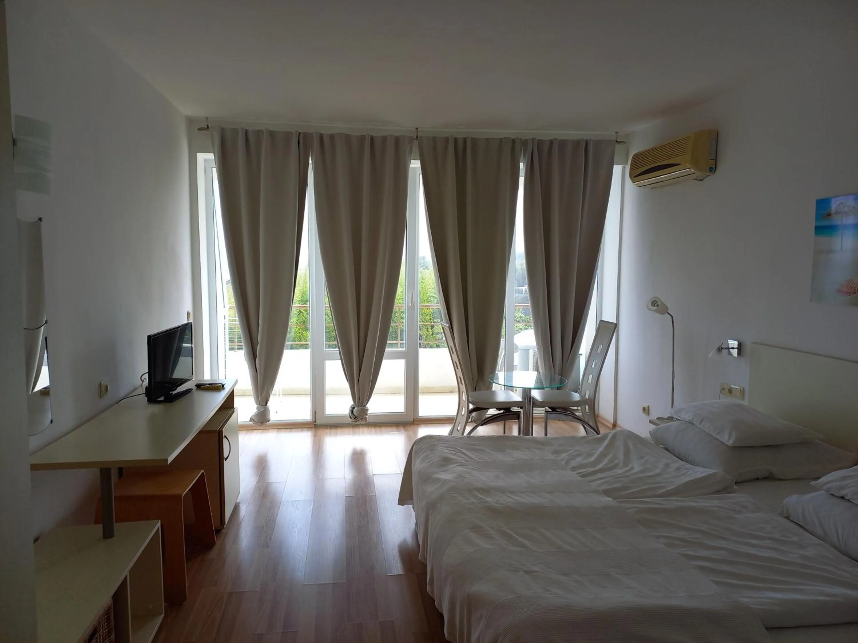 Bed in Aparthotel Romance
