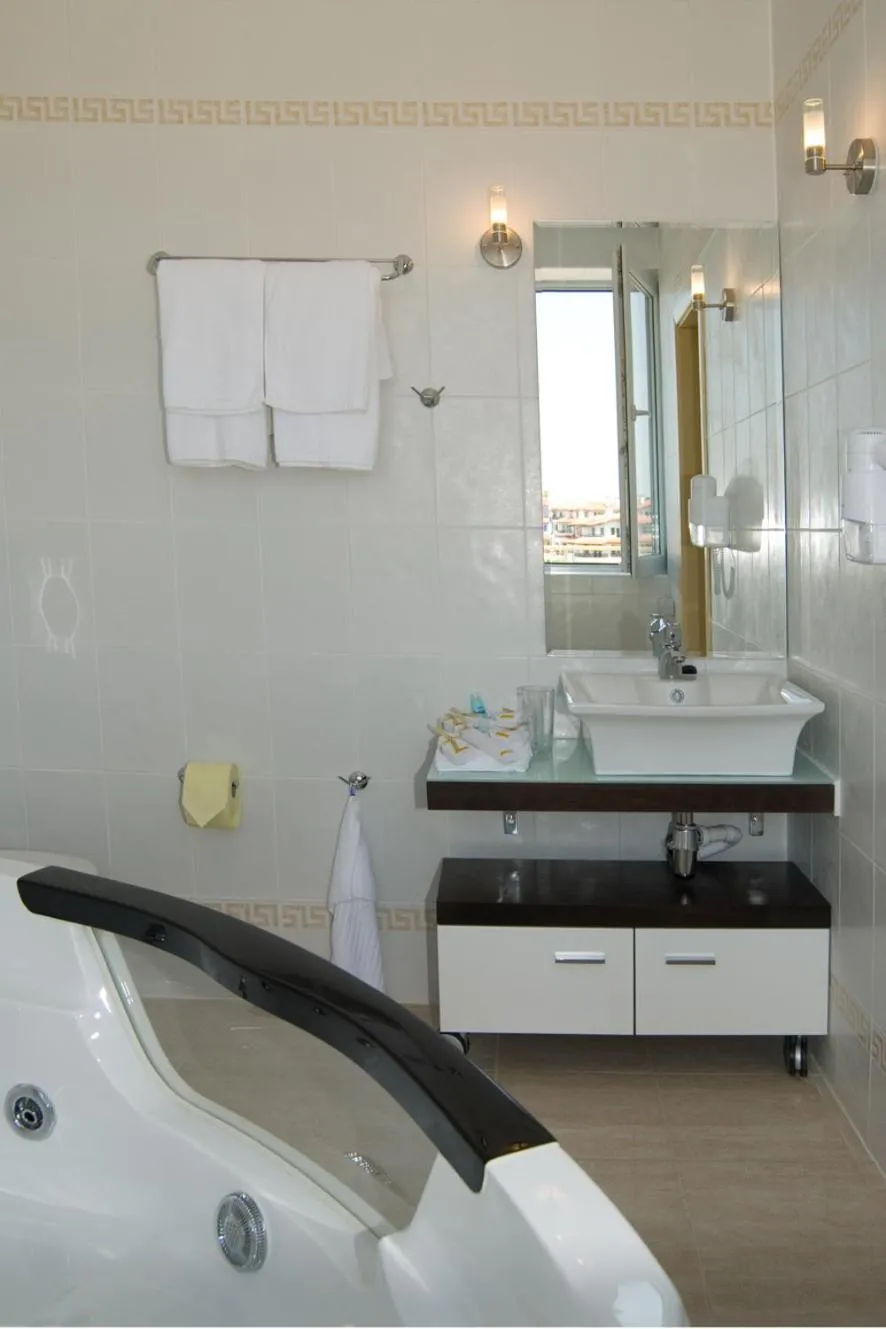 Bathroom in Aparthotel Romance