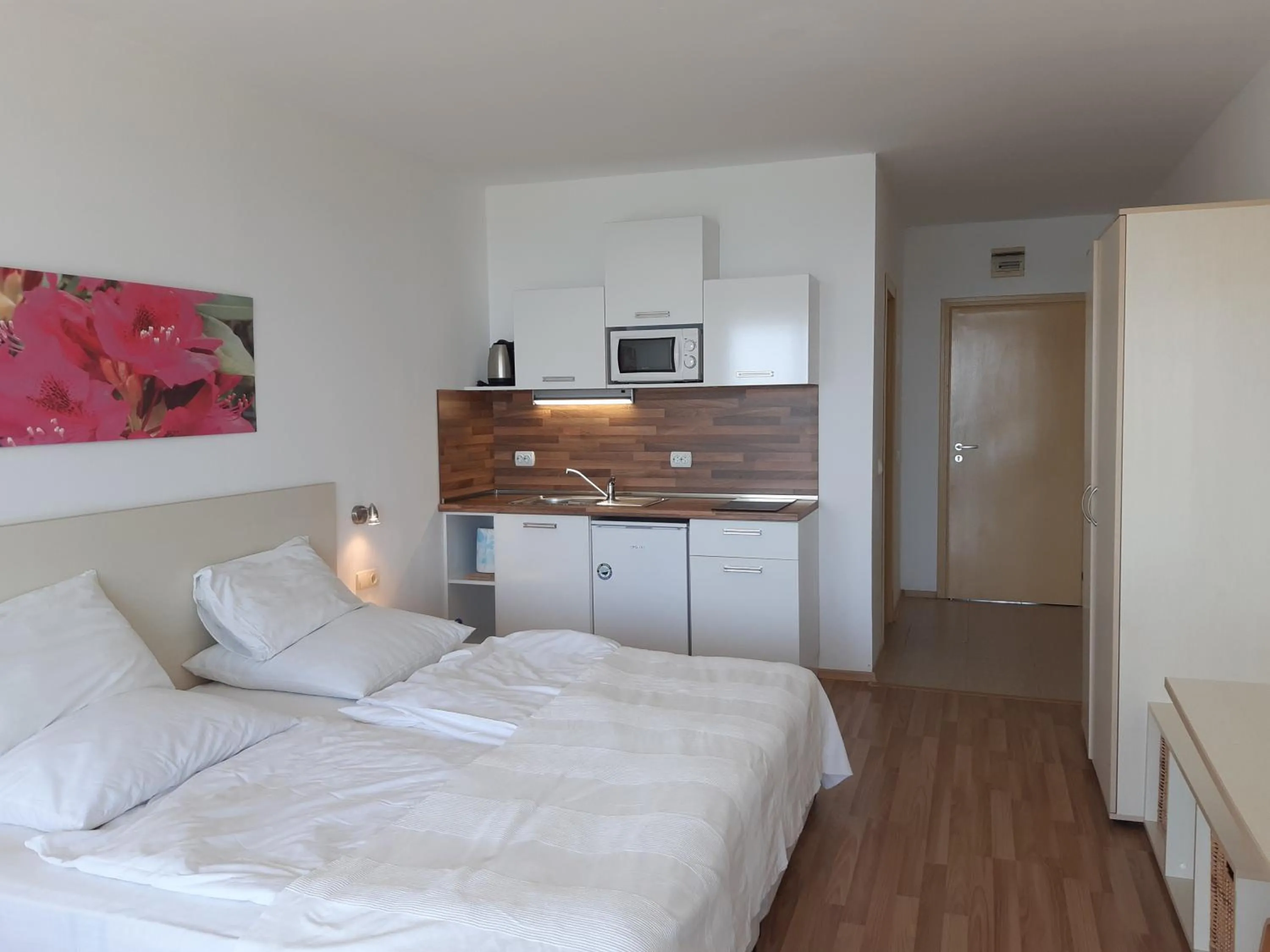 Bed in Aparthotel Romance