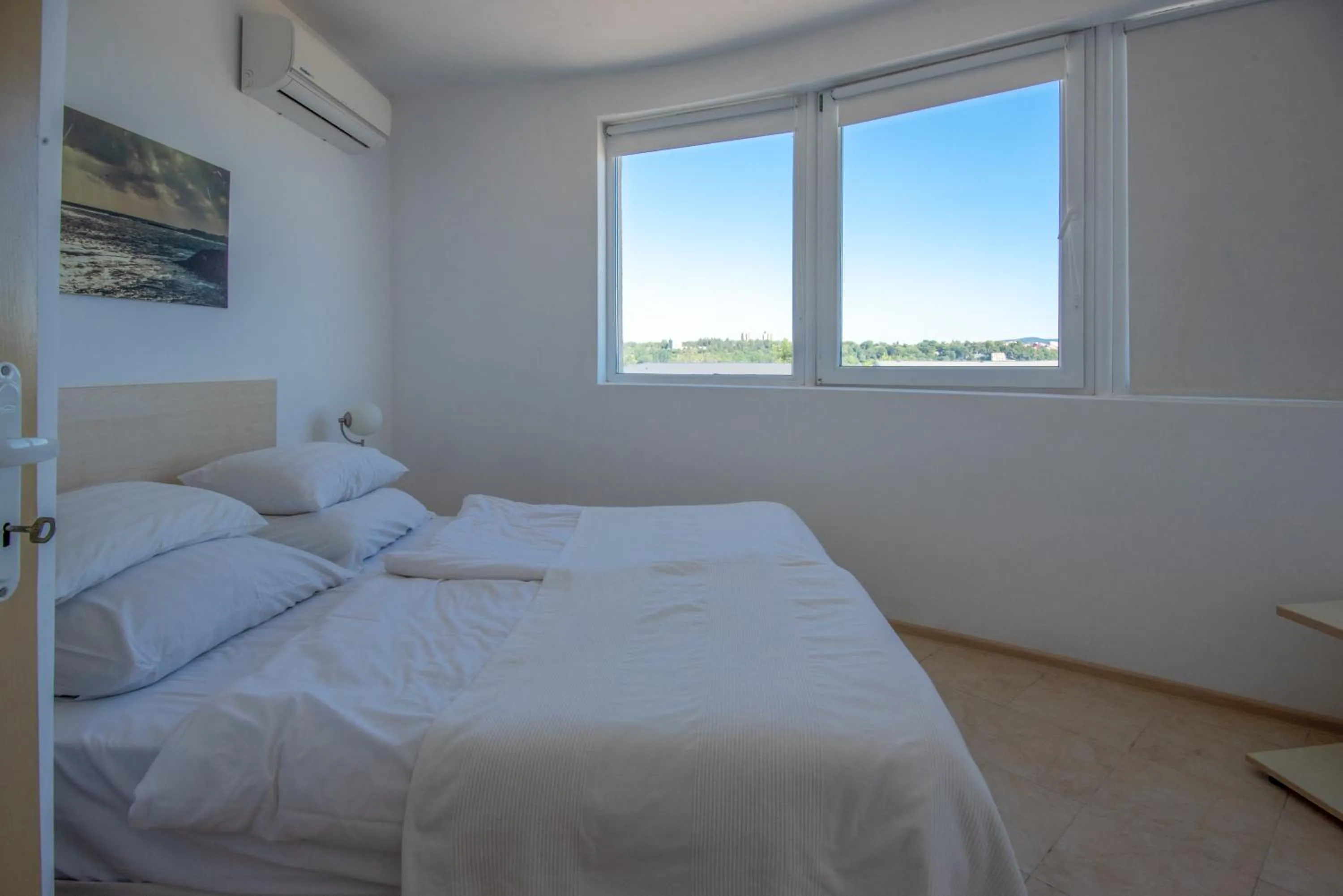 Bed in Aparthotel Romance