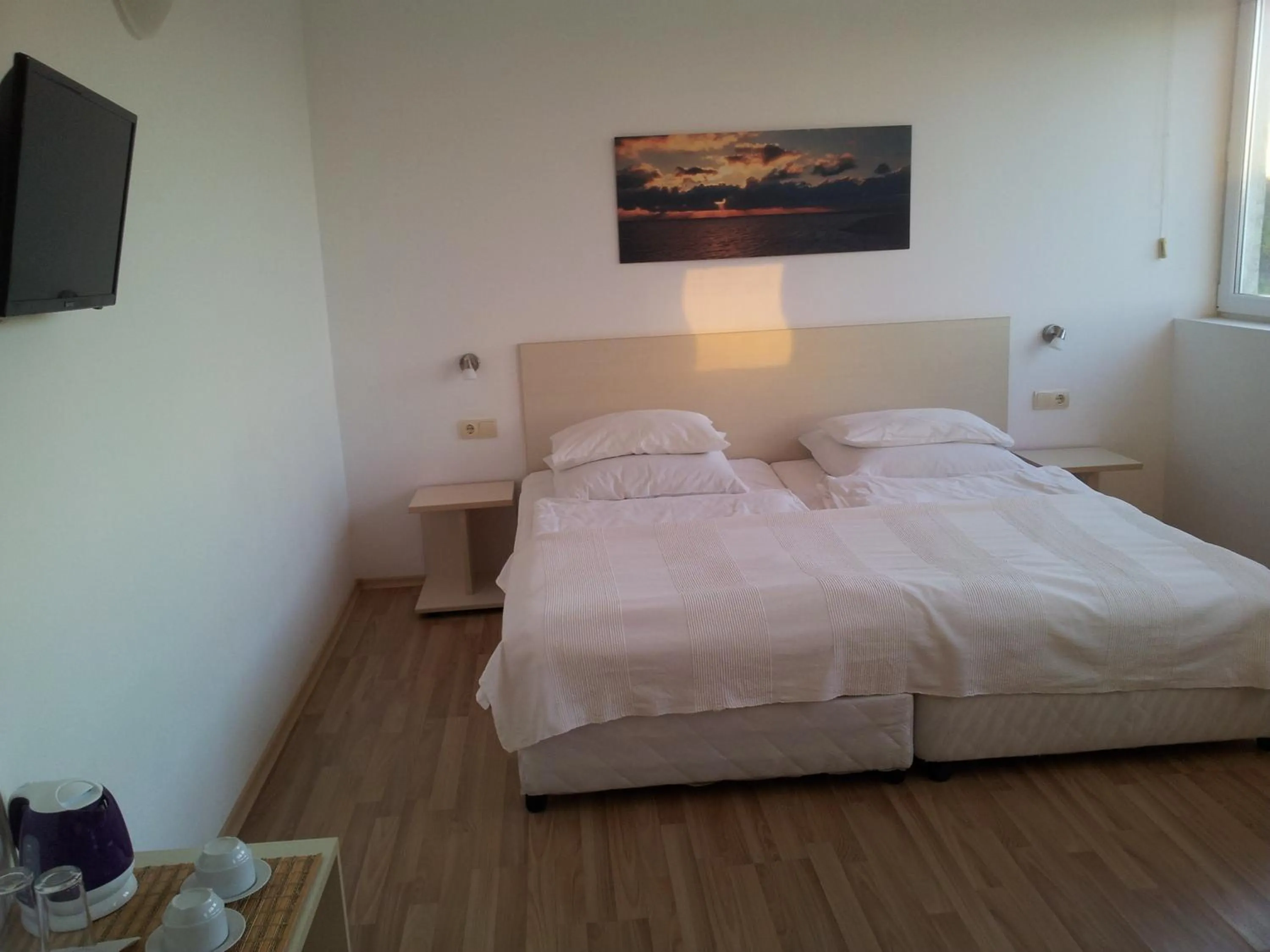 Bed in Aparthotel Romance