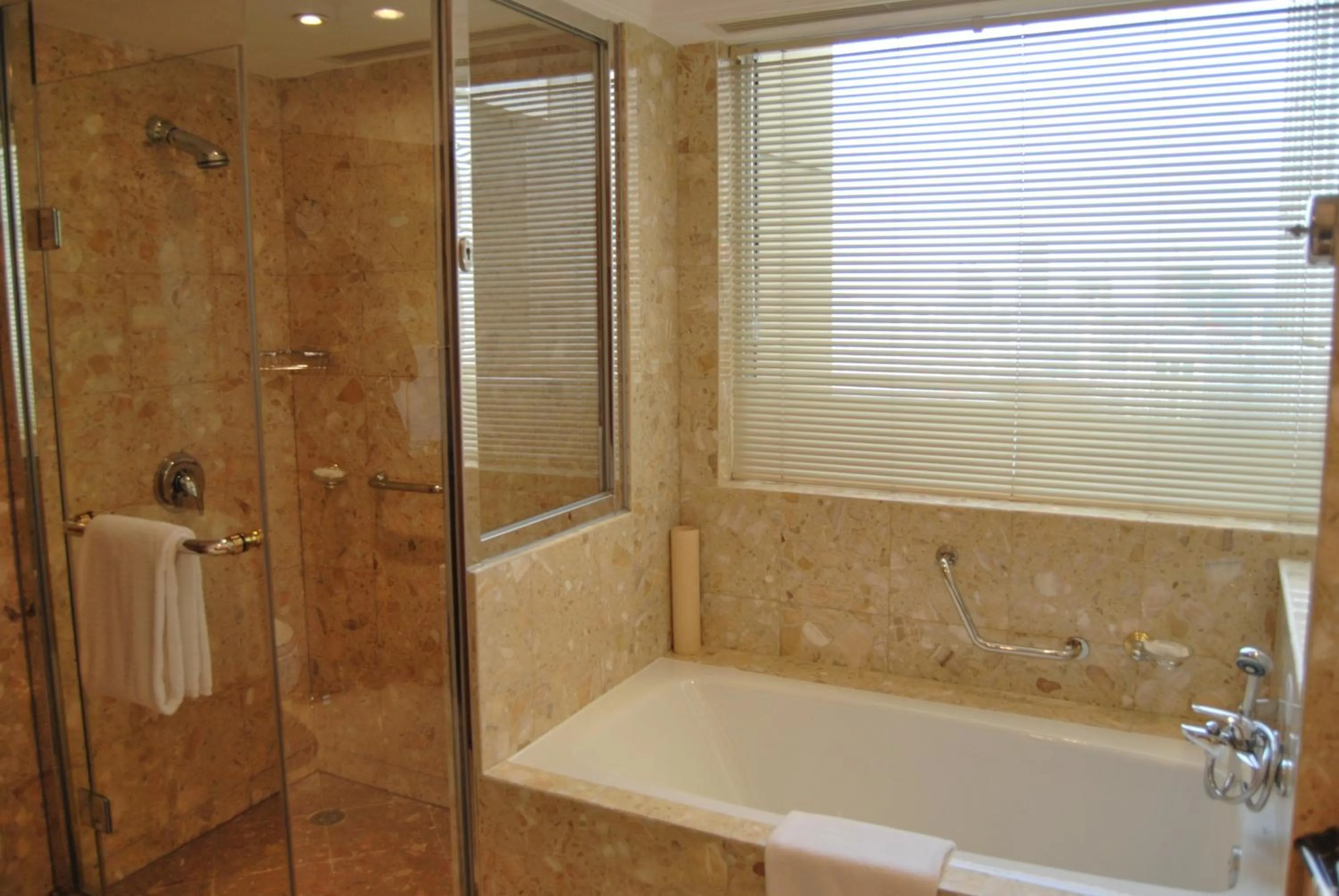 Bathroom in Crowne Plaza Qingdao by IHG