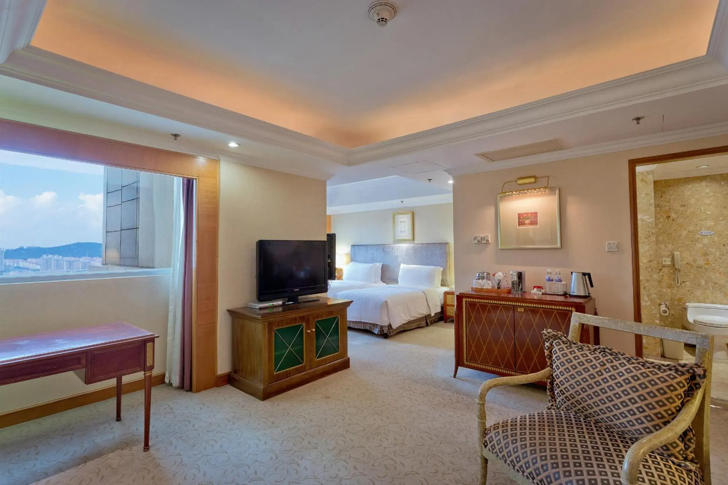 Living room, Bed in Crowne Plaza Qingdao by IHG Living room, Bed in Crowne Plaza Qingdao by IHG