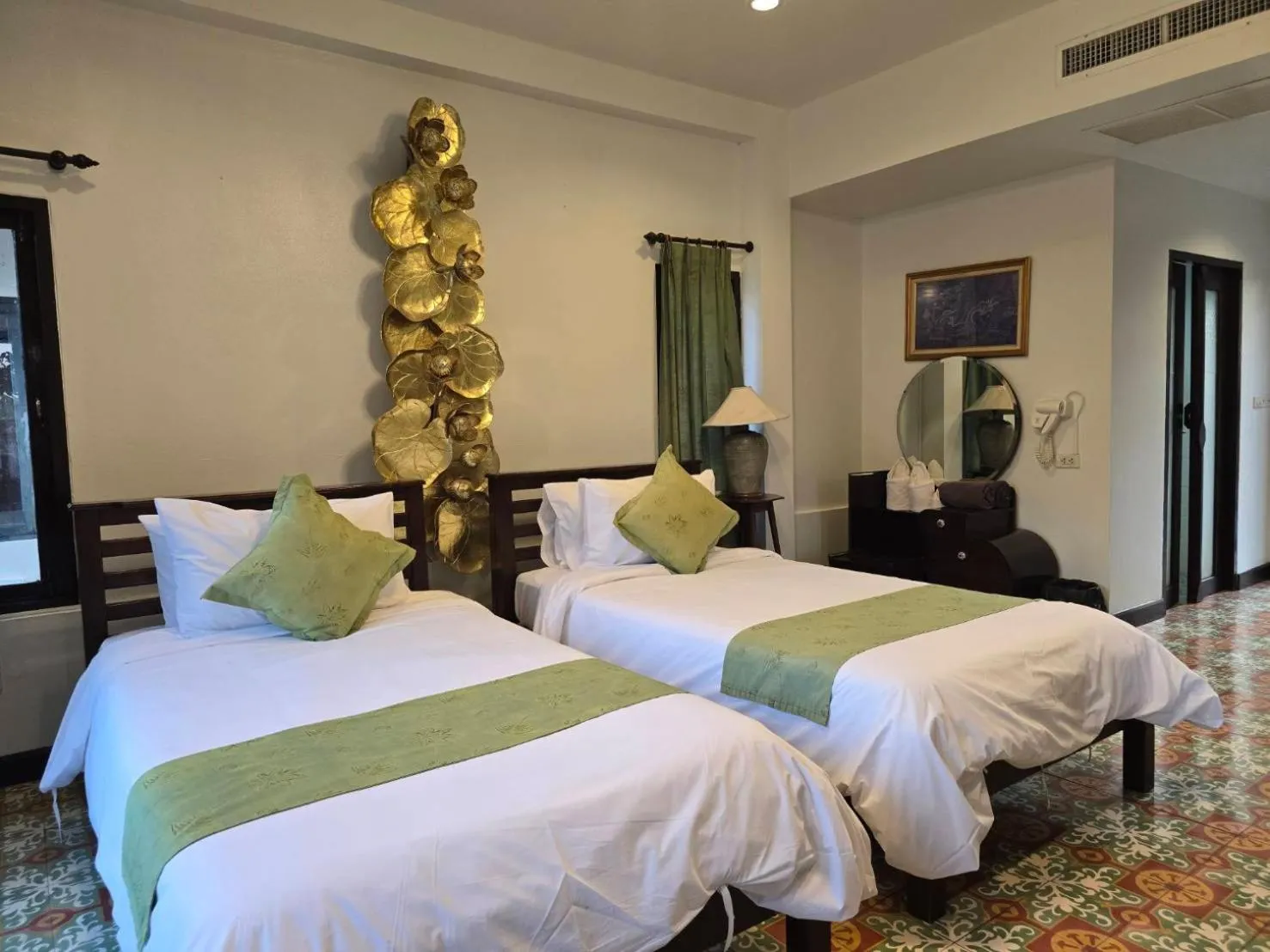 Bed in Pludhaya Resort & Spa