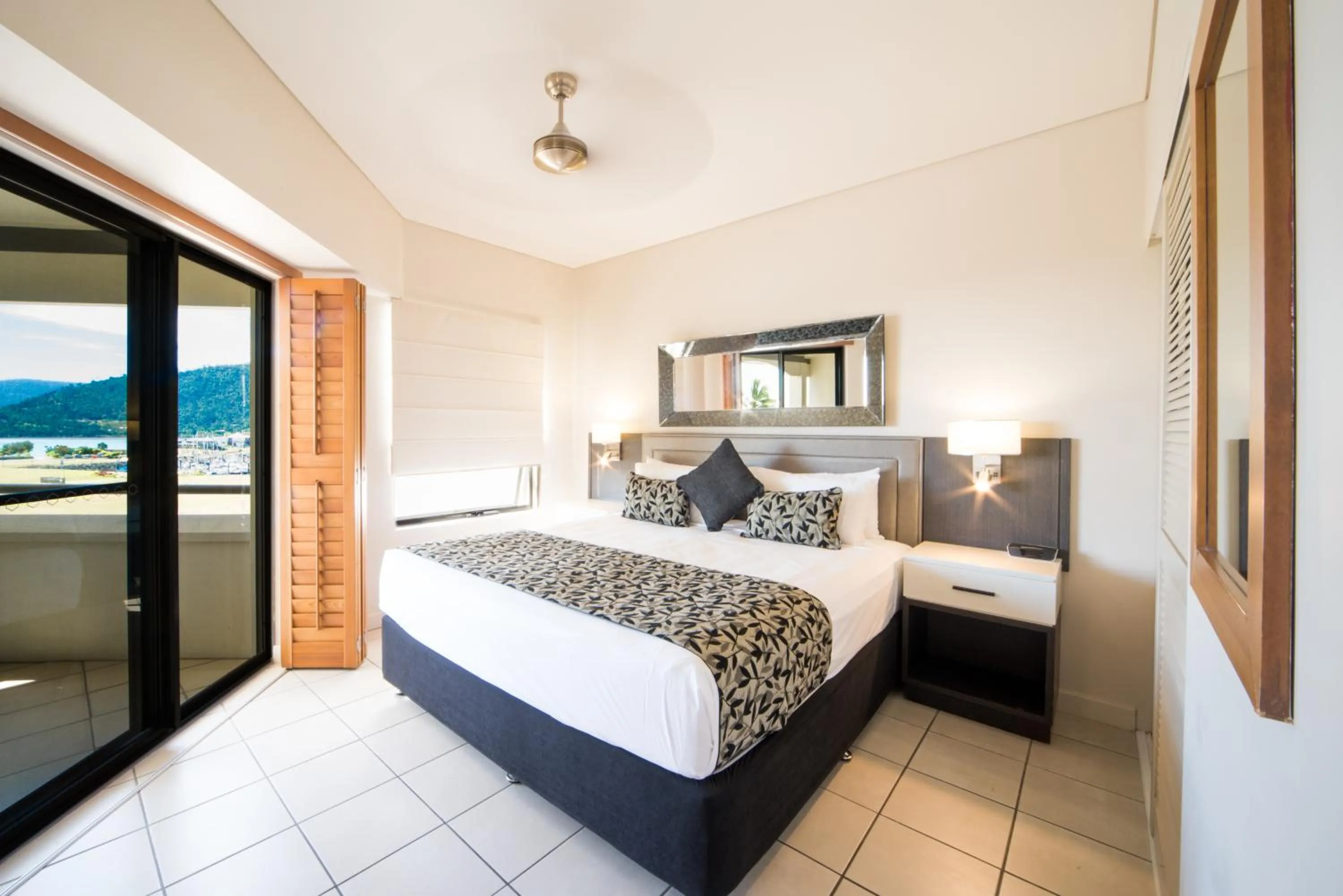 Bed in Portside Whitsunday Luxury Holiday Apartments