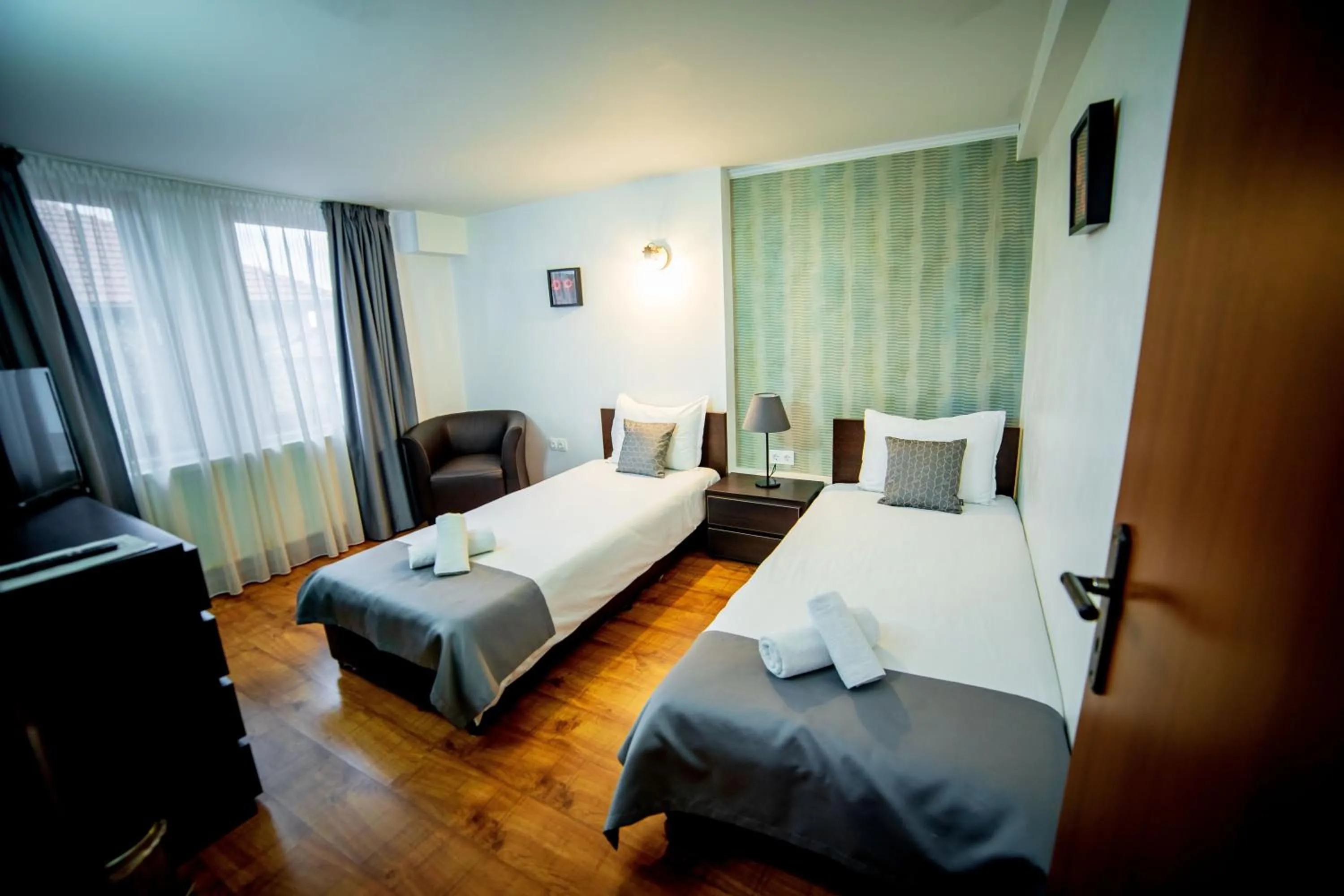 Bed in Velinov Boutique Hotel