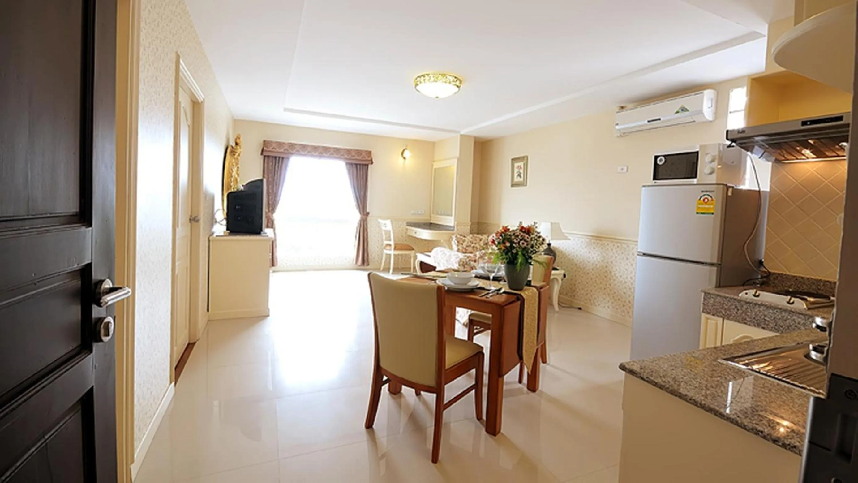 Kitchen or kitchenette in The Airport Greenery Hotel