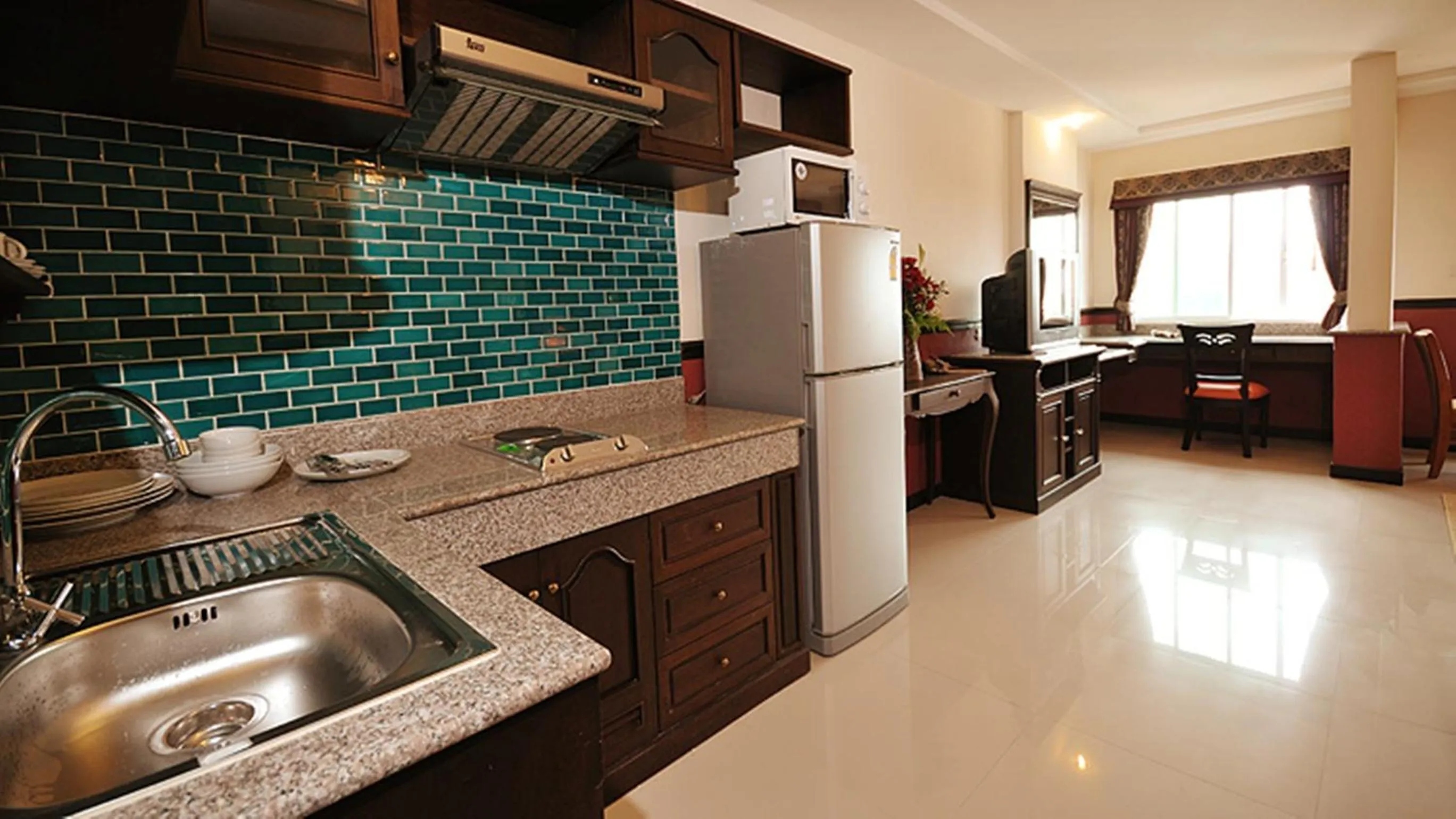 Kitchen or kitchenette in The Airport Greenery Hotel