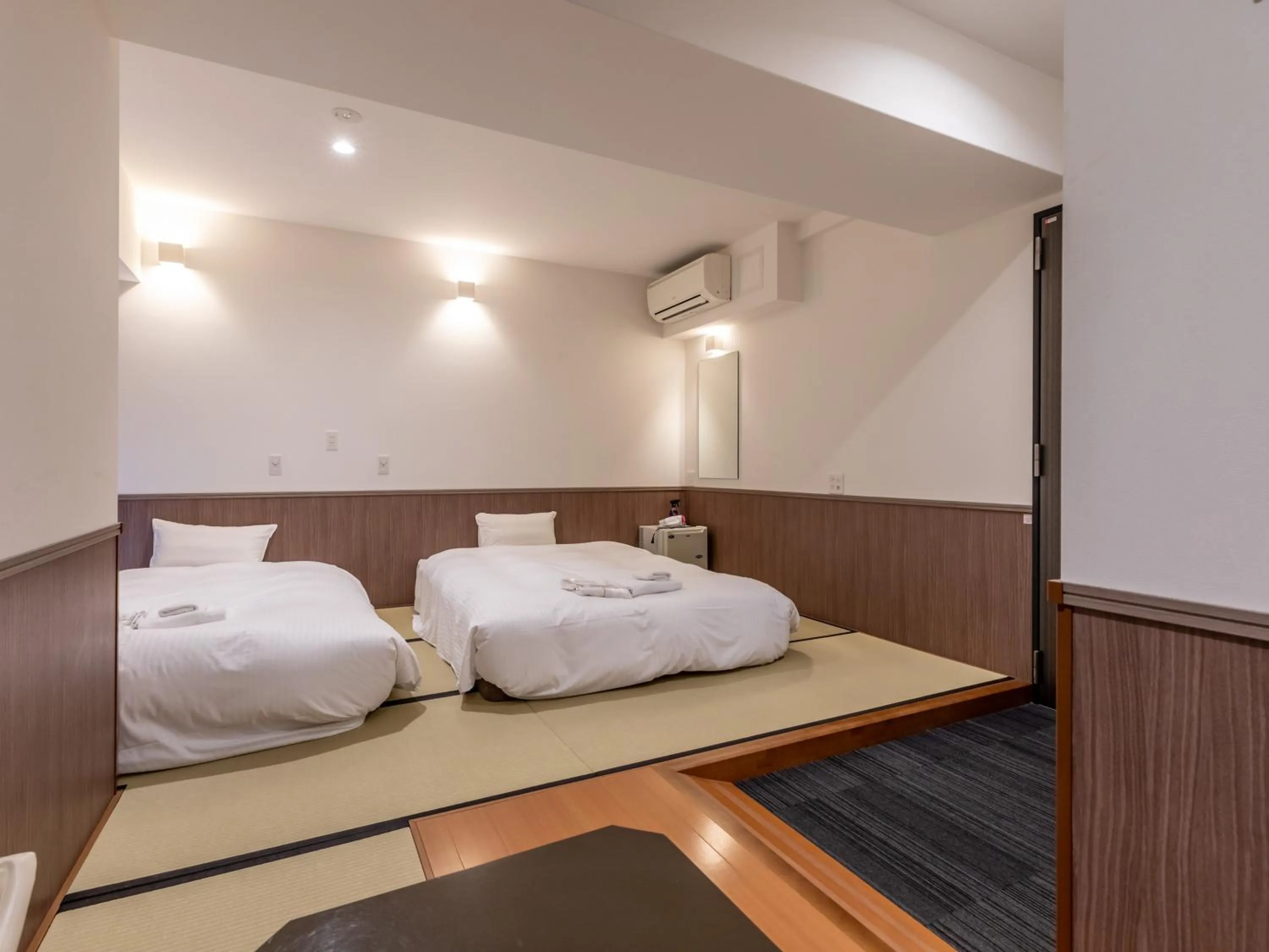 Bed in Hotel Excellence Enmachi Ekimae