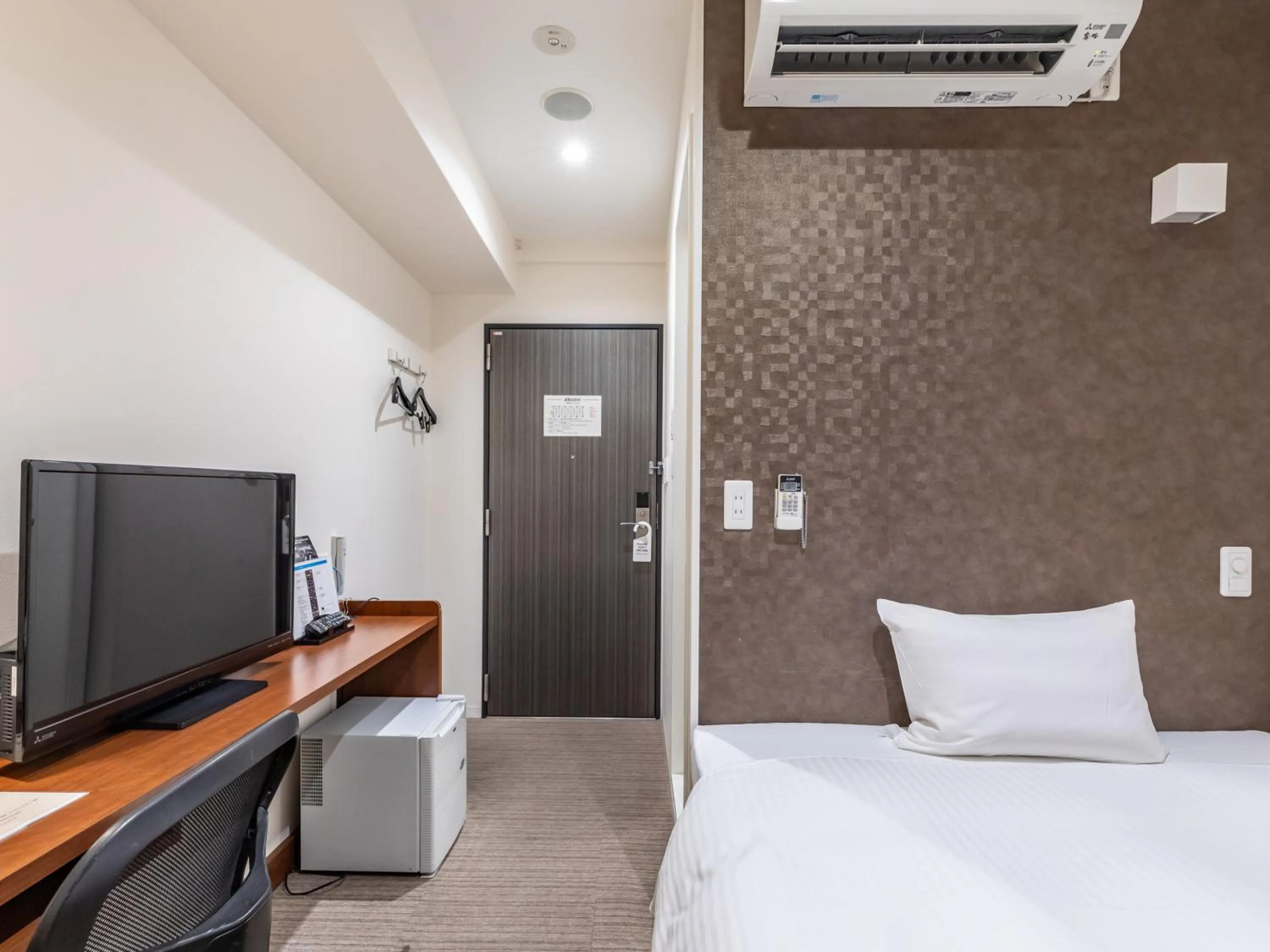 Bed in Hotel Excellence Enmachi Ekimae