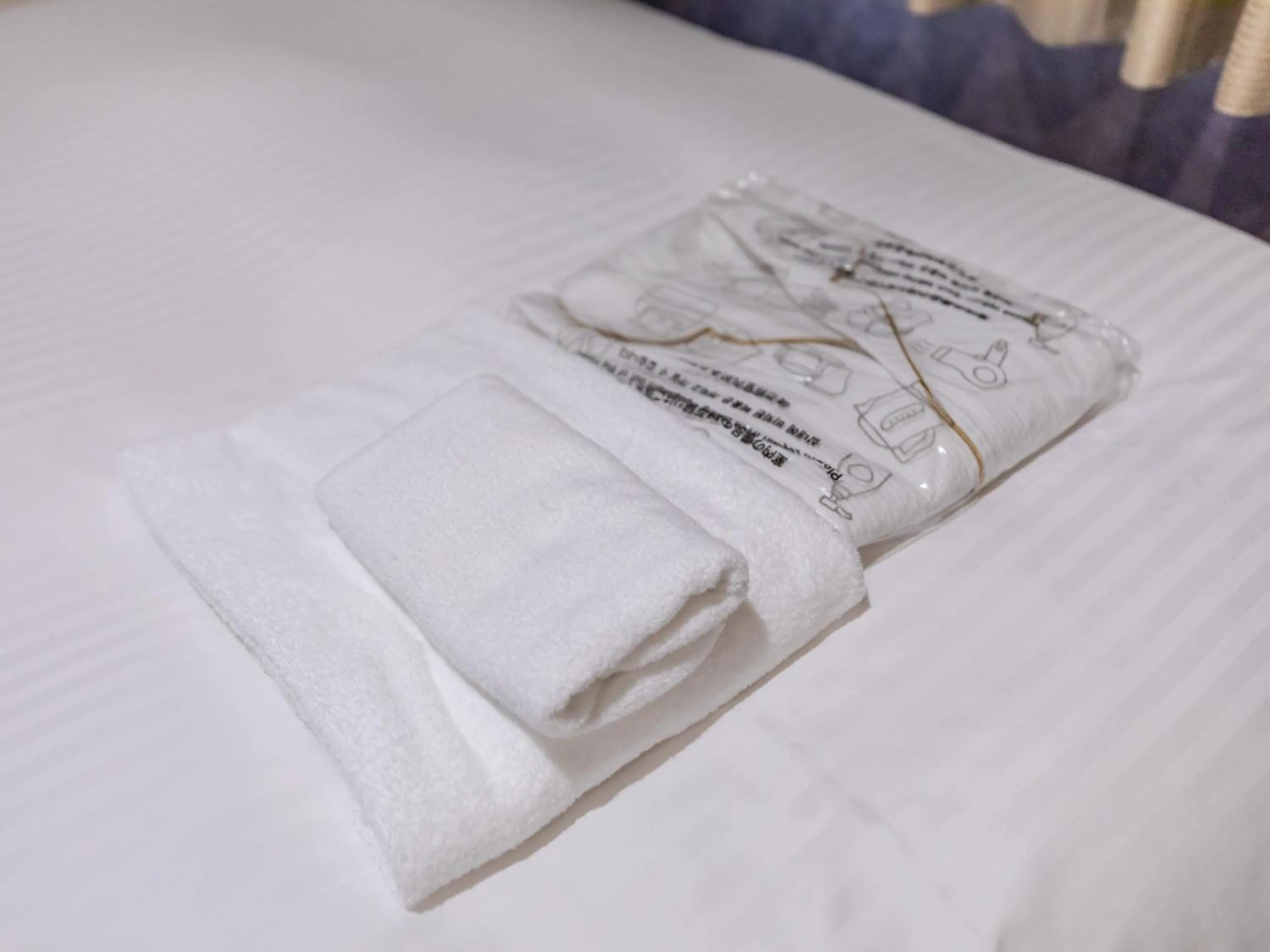towels, Bed in Hotel Excellence Enmachi Ekimae