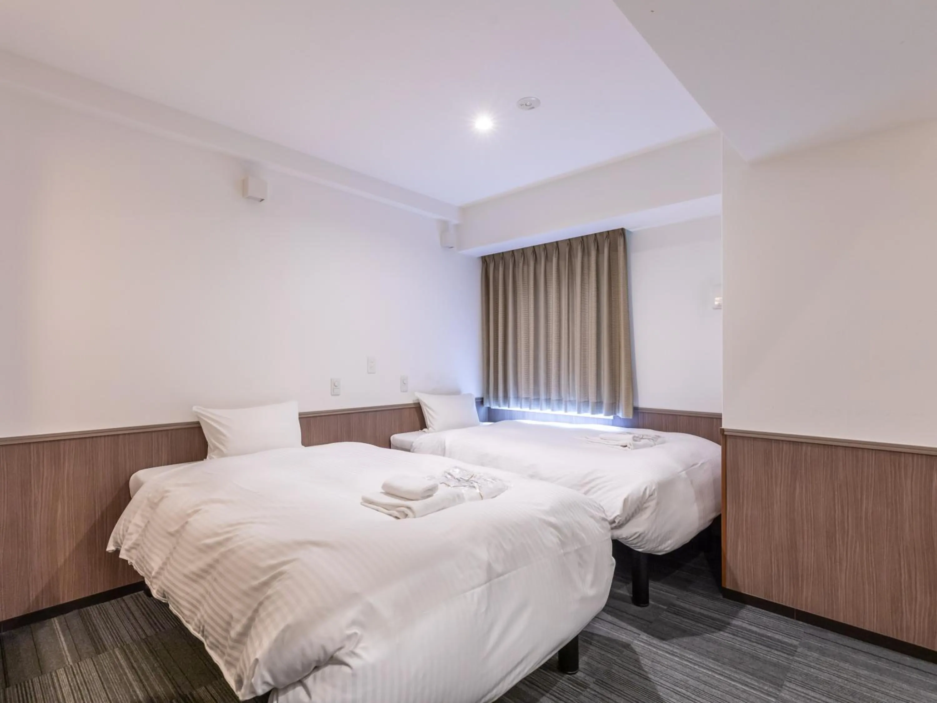 Bed in Hotel Excellence Enmachi Ekimae