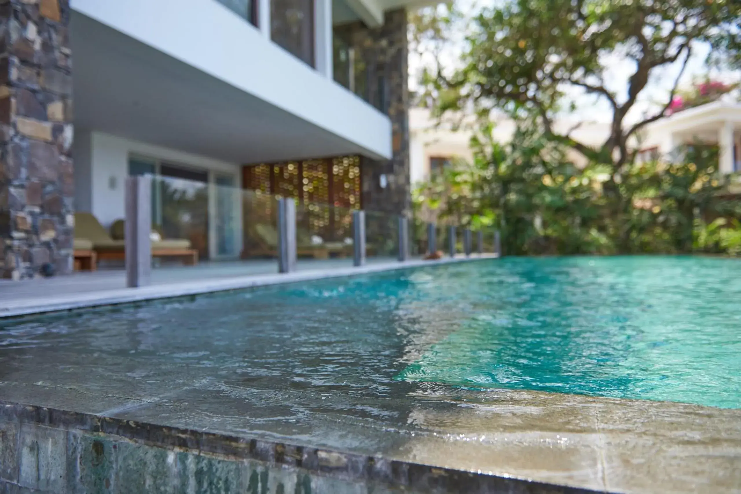 Pool view in Rajavilla Lombok Resort - Seaside Serenity Pool view in Rajavilla Lombok Resort - Seaside Serenity