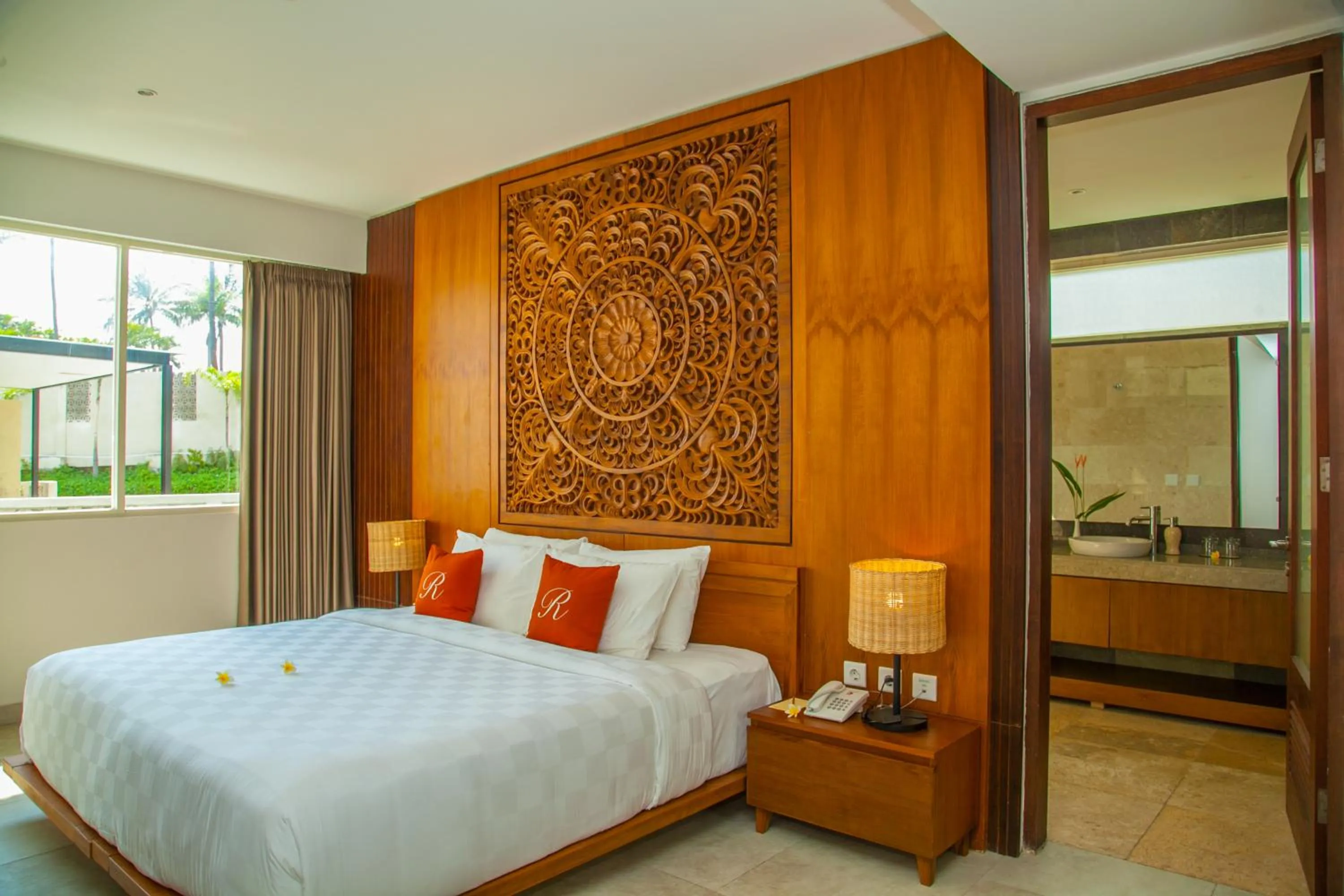 Bed in Rajavilla Lombok Resort - Seaside Serenity