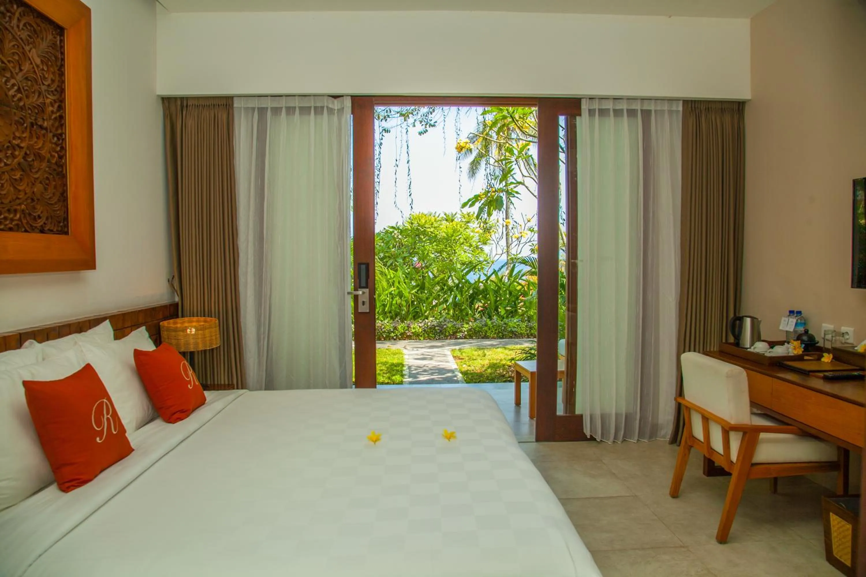 Bed in Rajavilla Lombok Resort - Seaside Serenity