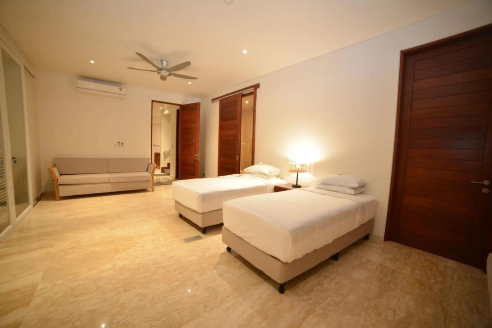 Bed in Rajavilla Lombok Resort - Seaside Serenity