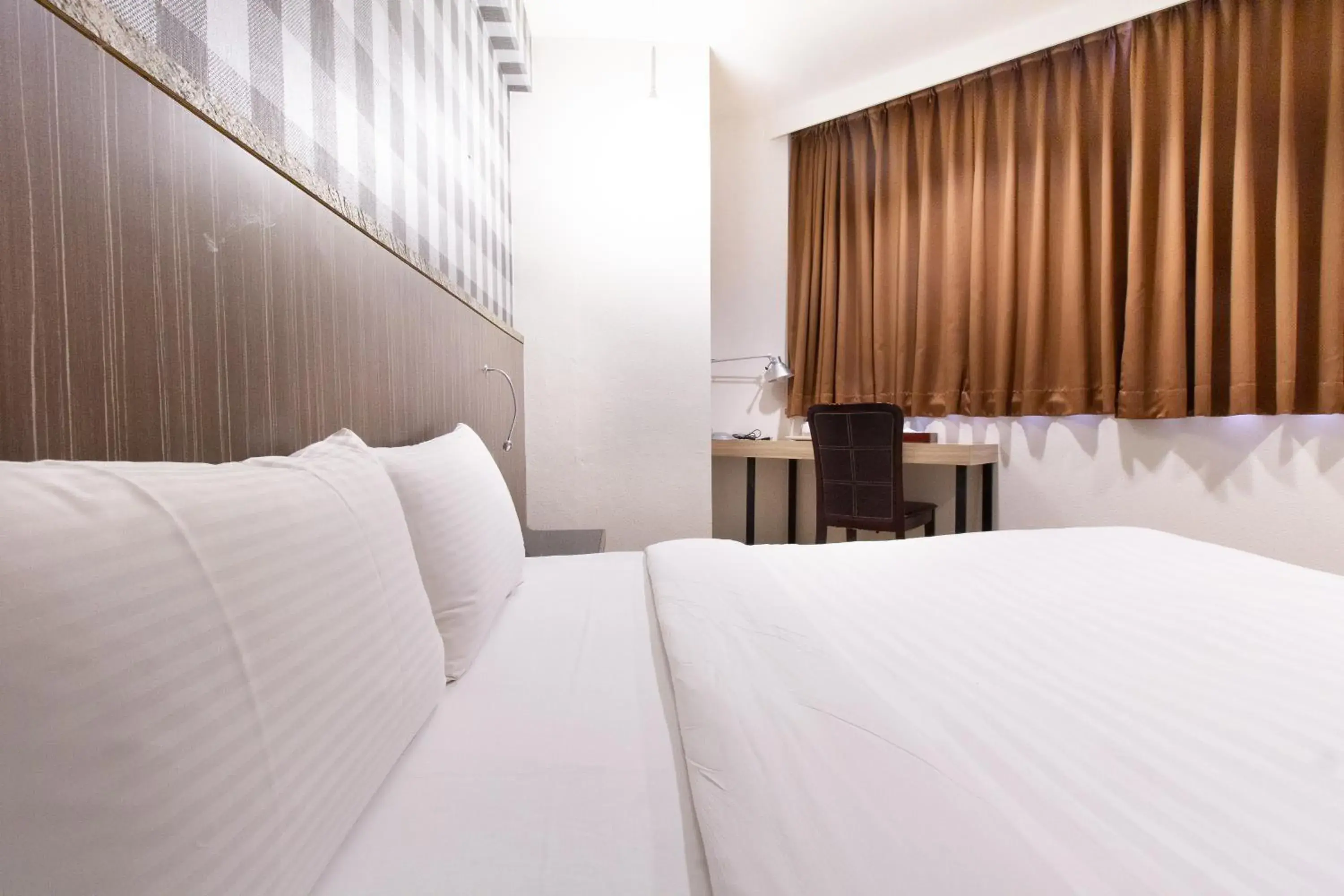 Bed in Hwa Nan Hotel Bed in Hwa Nan Hotel