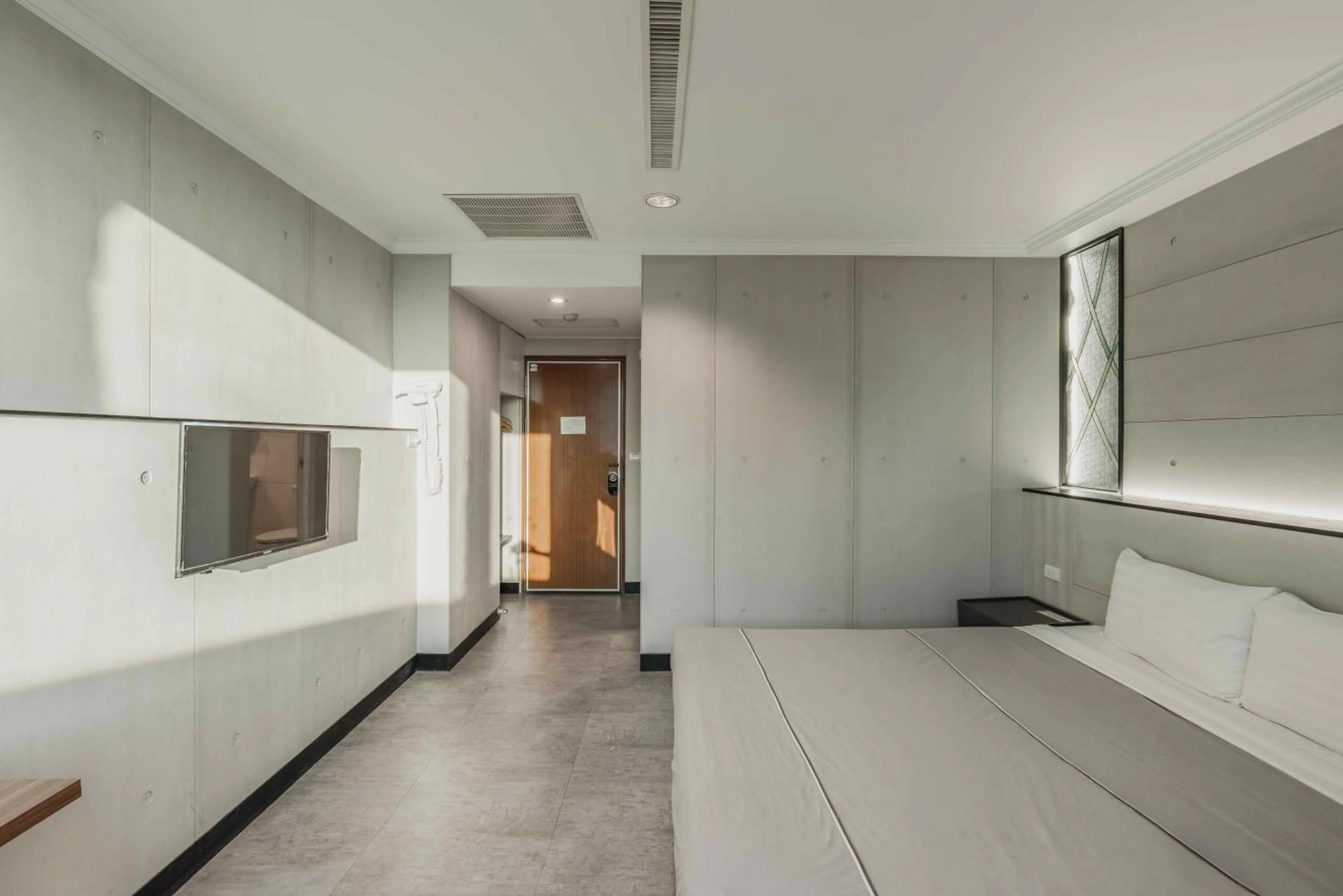 TV and multimedia, Bed in Hwa Nan Hotel