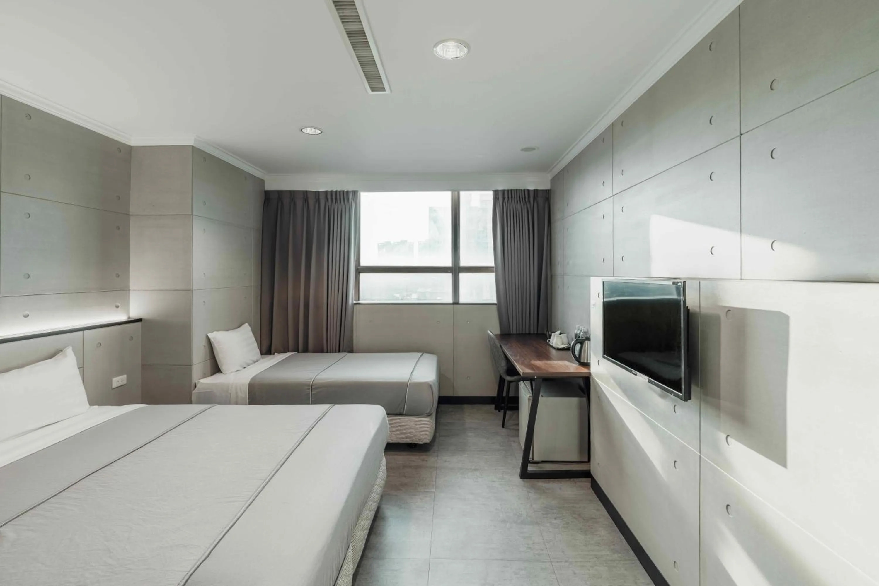 Photo of the whole room, Bed in Hwa Nan Hotel