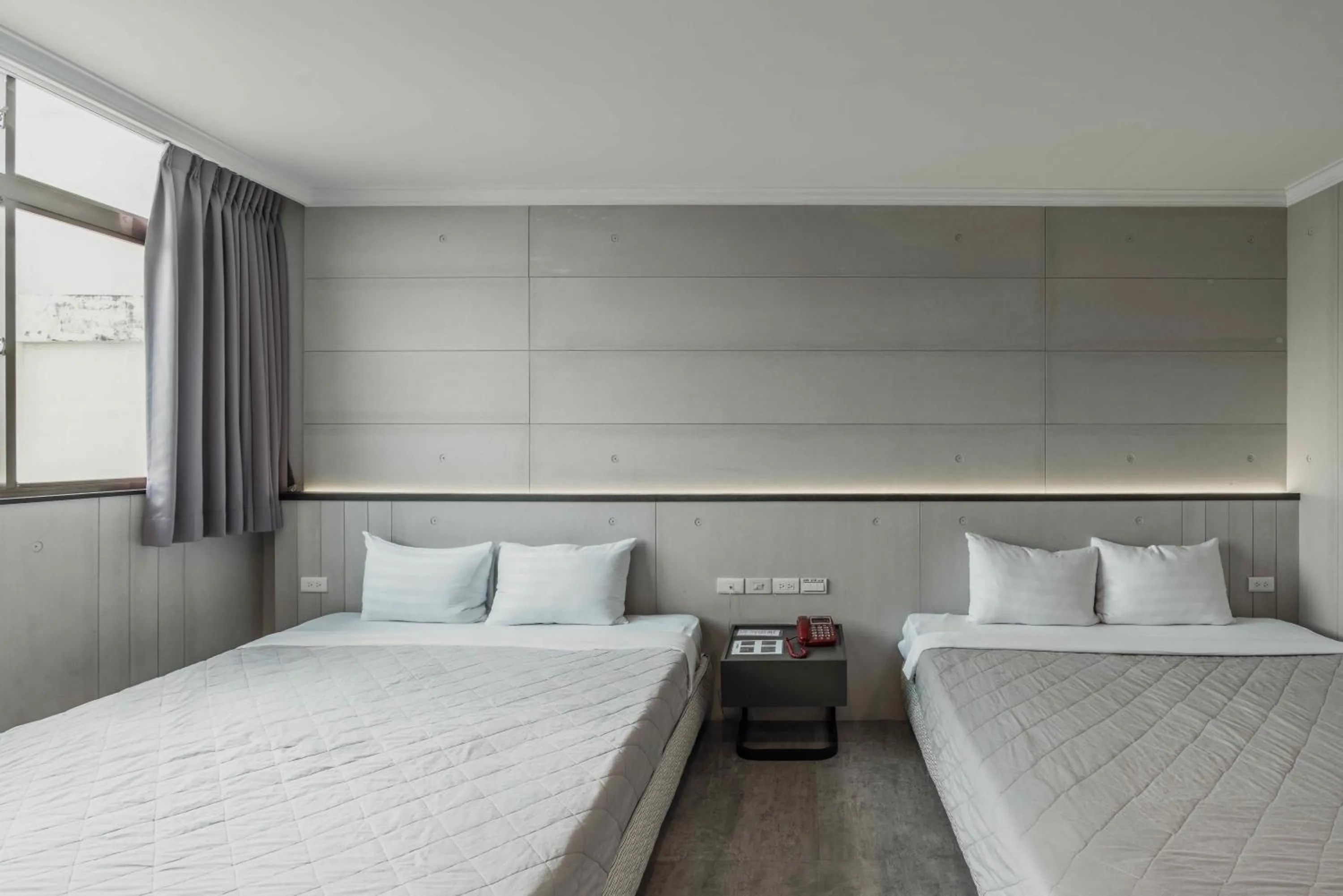 Photo of the whole room, Bed in Hwa Nan Hotel