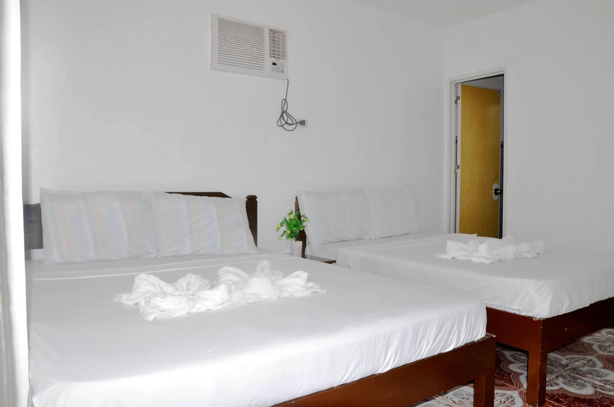 Bed in Nanette's Tourist Inn