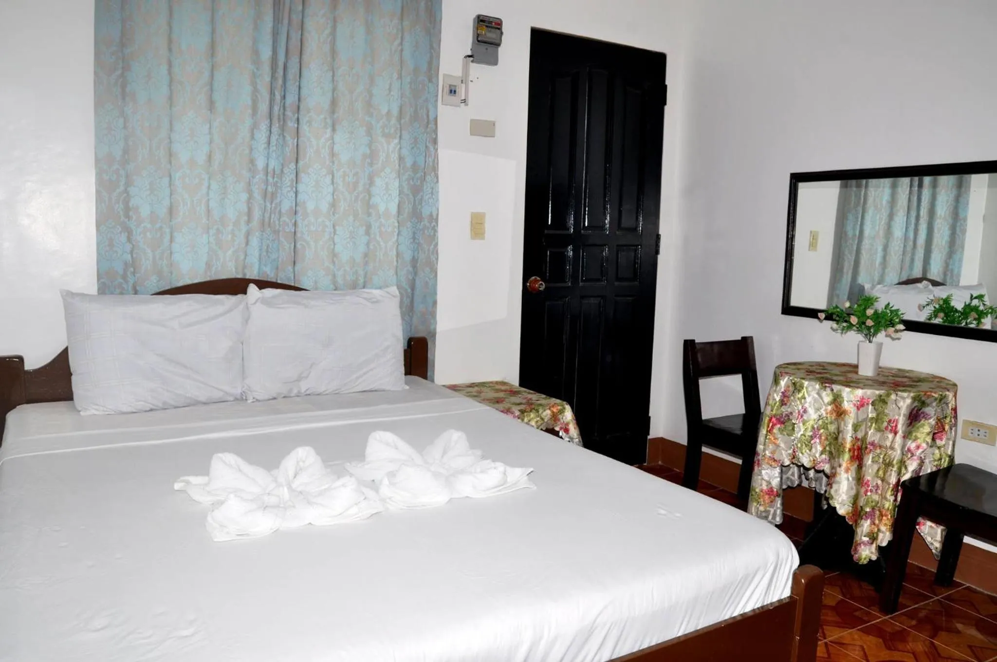 Bed in Nanette's Tourist Inn