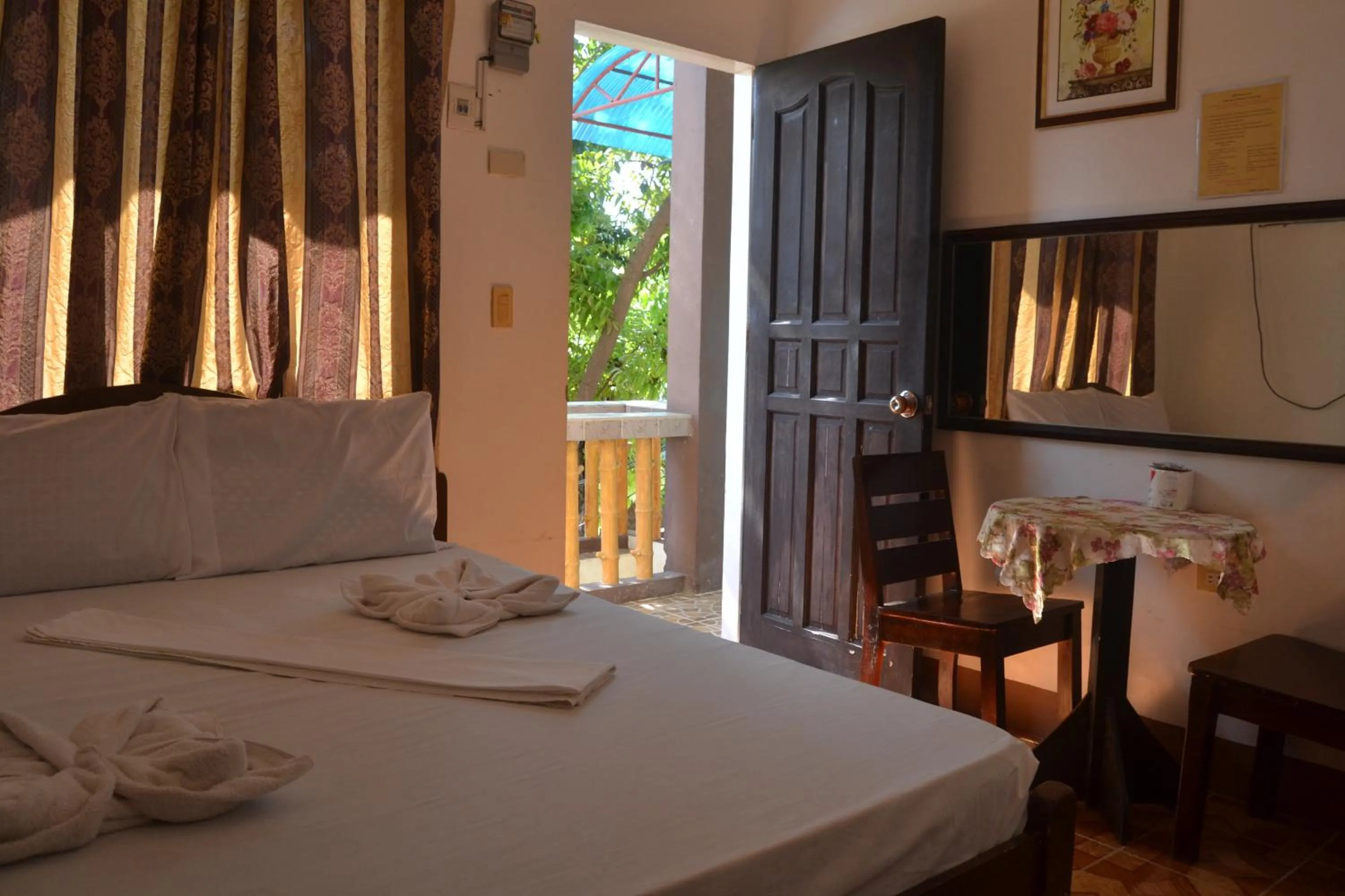 Bed in Nanette's Tourist Inn