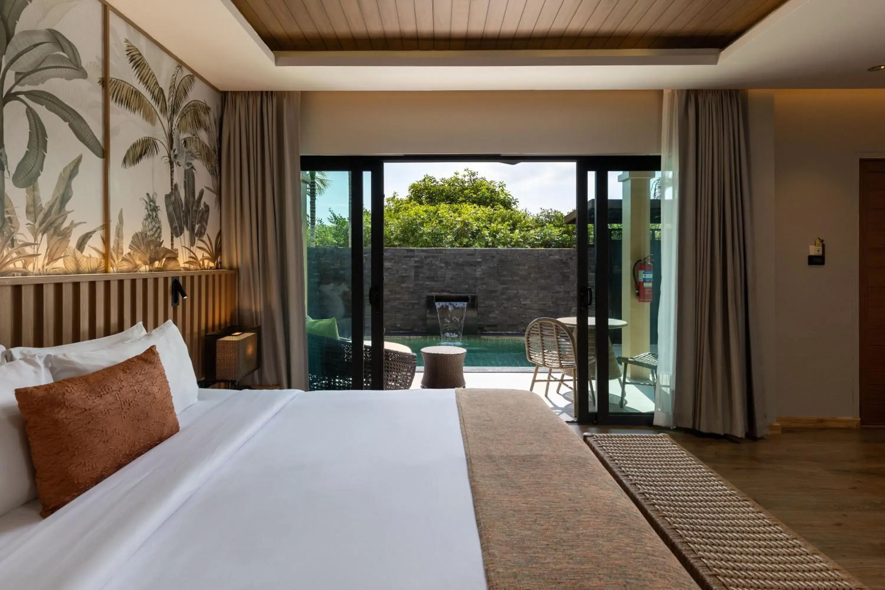 Bed in De Malee Pool Villas - SHA Extra Plus Bed in De Malee Pool Villas - SHA Extra Plus