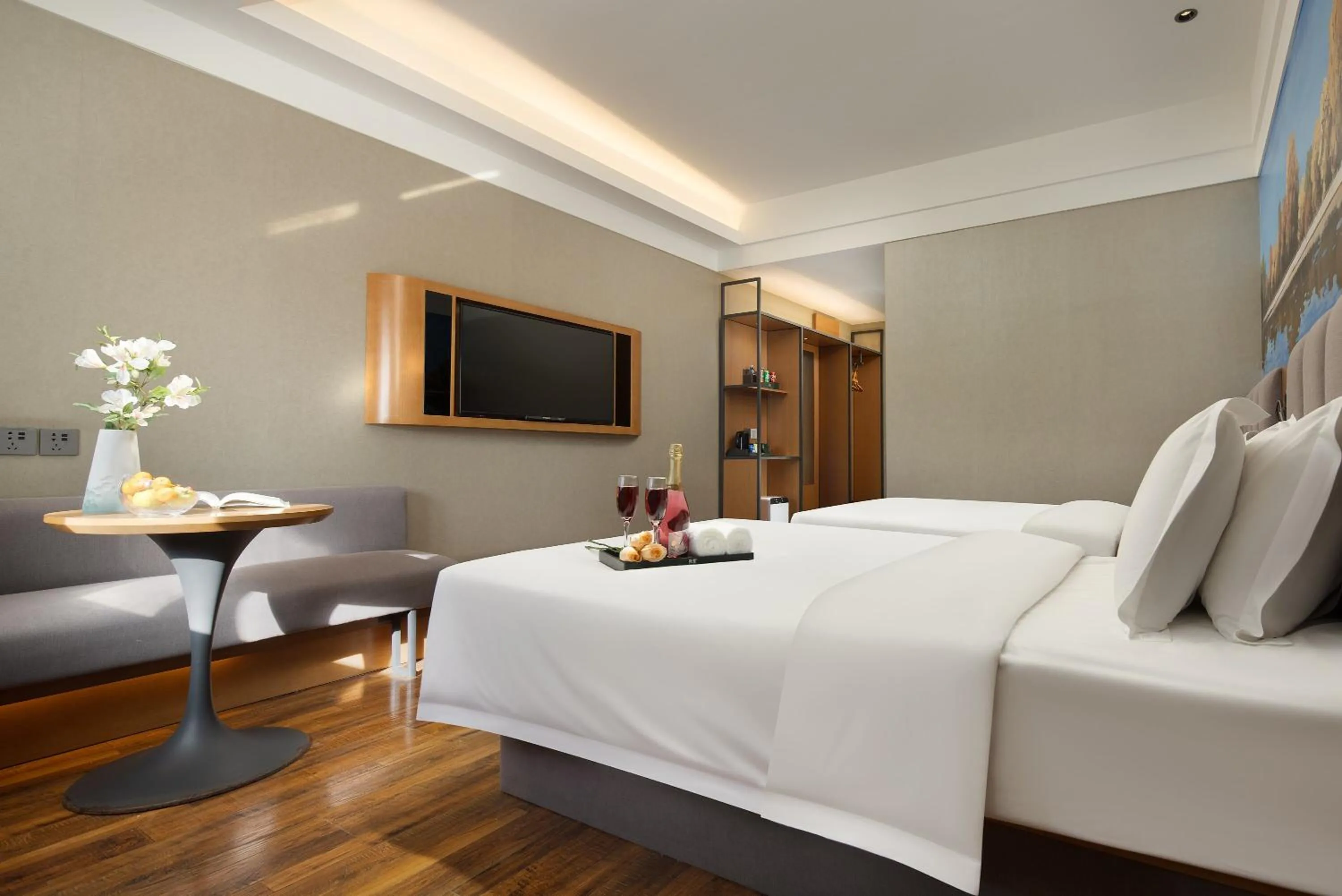 Living room, Bed in True Go Hotel Beijing New International Exhibition Center Capital Airport