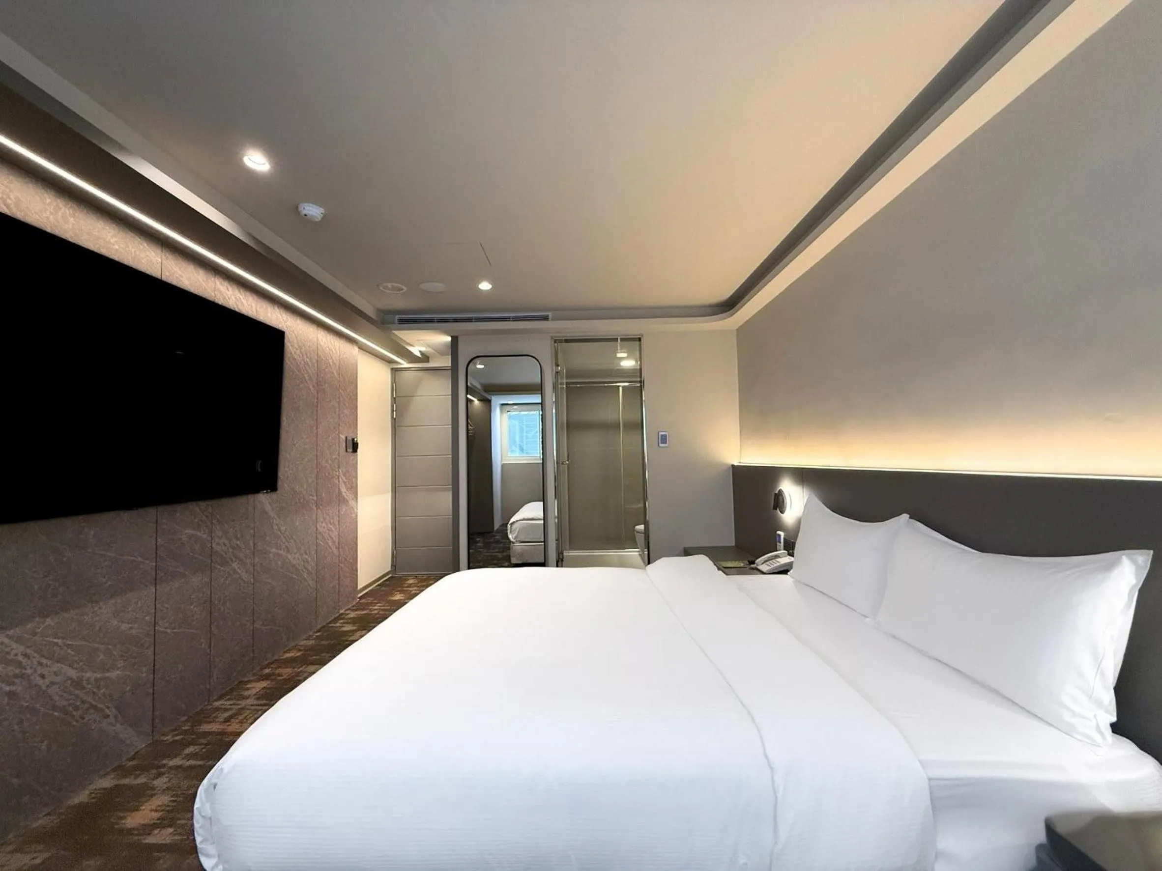 Bed in Hub Hotel Ximen-inn Kunming