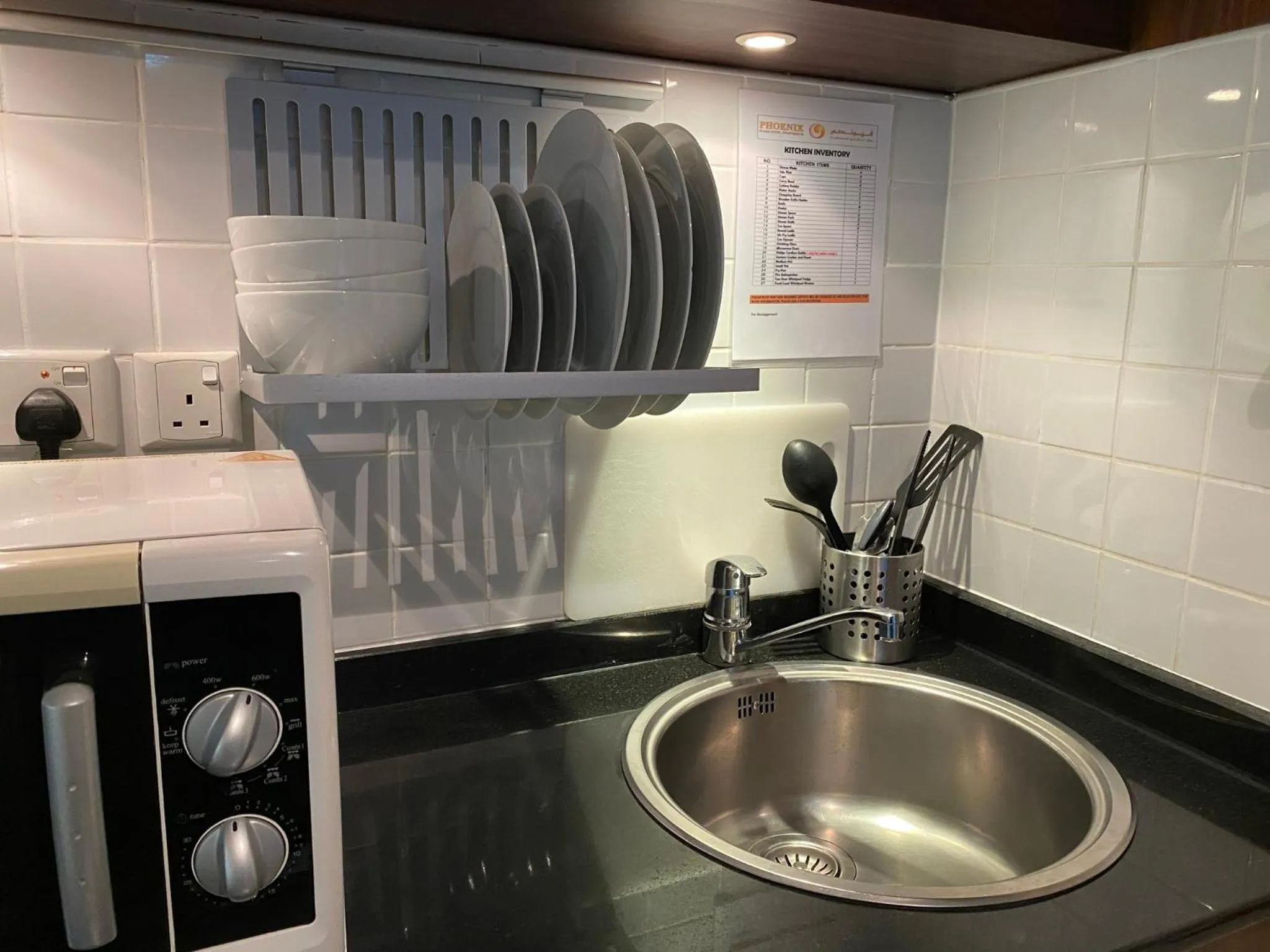 Kitchen or kitchenette in Phoenix Plaza Hotel Apartments