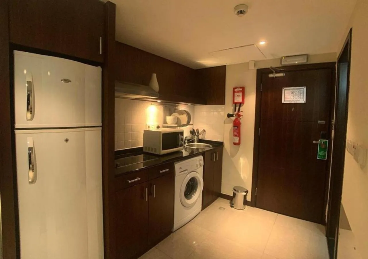 Kitchen or kitchenette in Phoenix Plaza Hotel Apartments