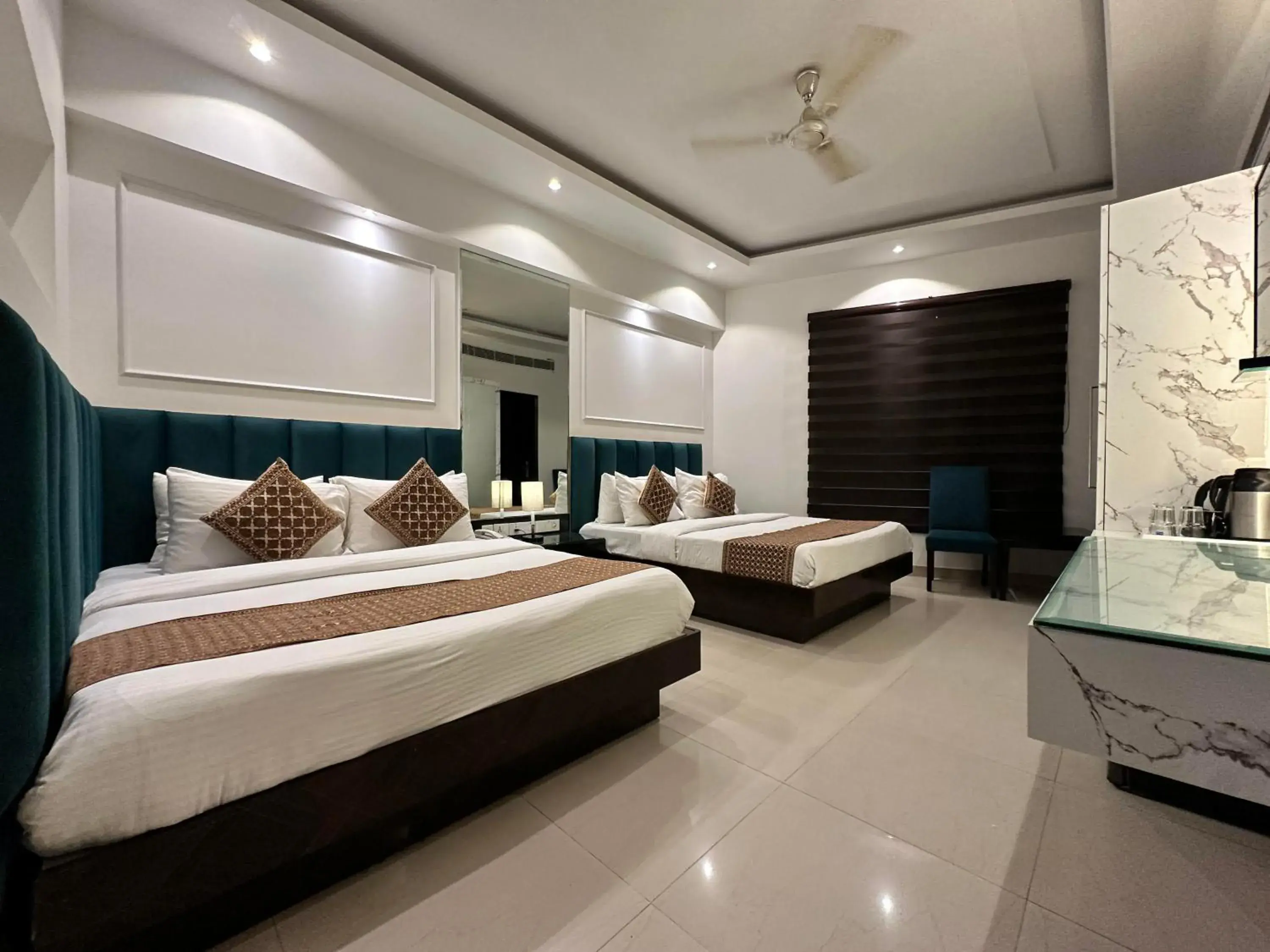 Photo of the whole room, Bed in Hotel Krishna - By RCG Hotels, Paharganj, New Delhi Photo of the whole room, Bed in Hotel Krishna - By RCG Hotels, Paharganj, New Delhi