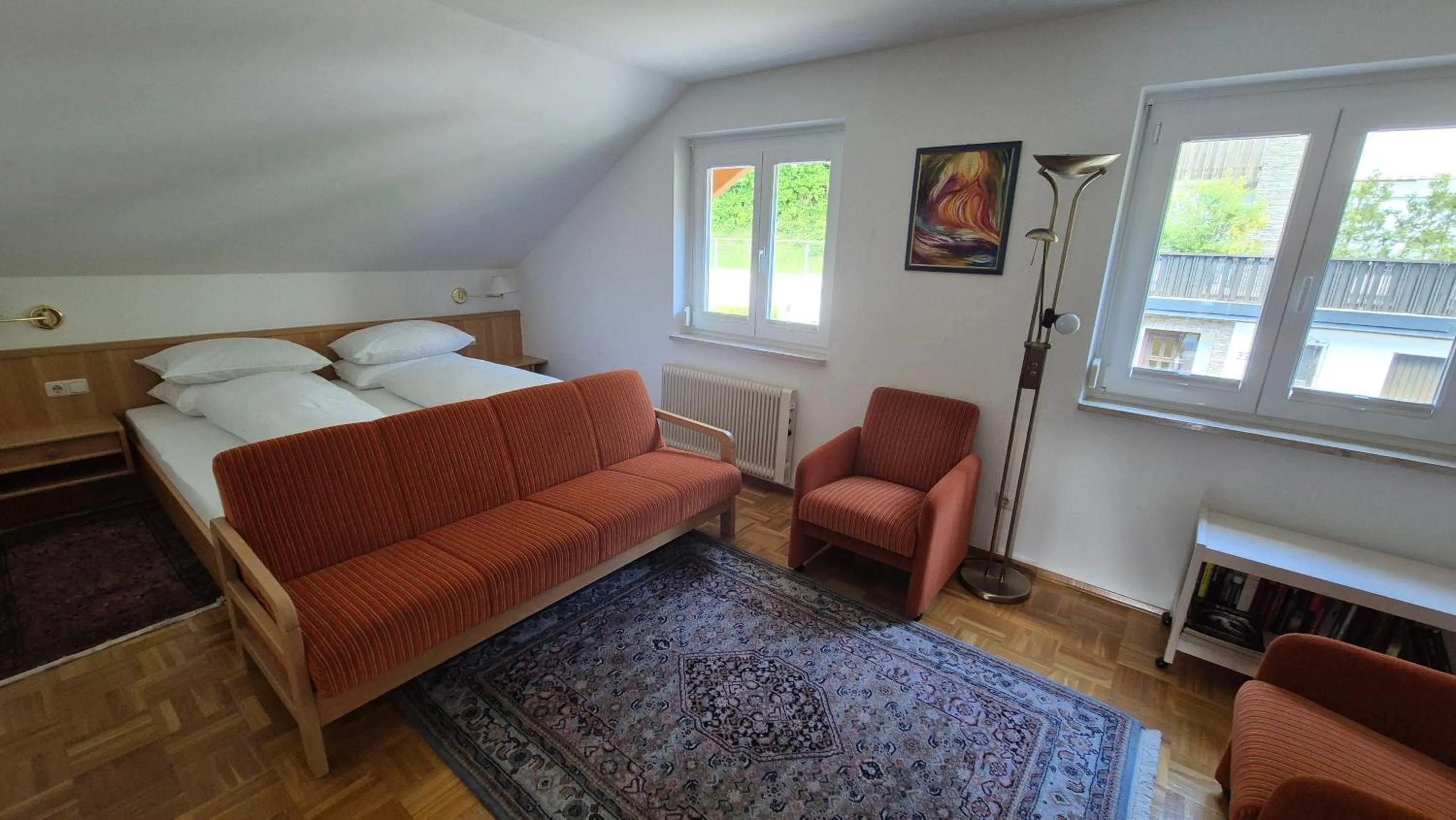 Bed in Haus Kraller-Urlaub mit Seeblick