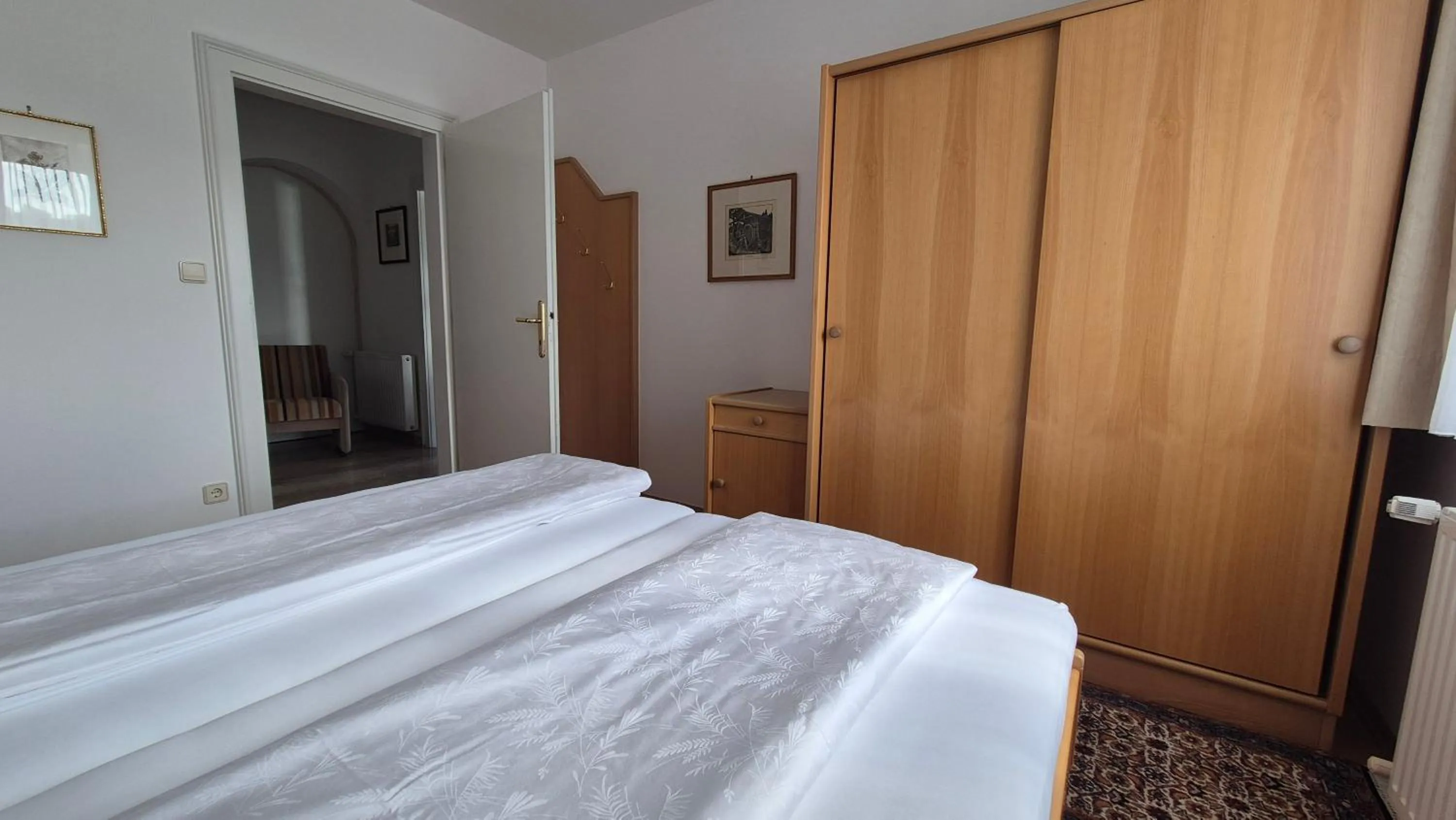 Bed in Haus Kraller-Urlaub mit Seeblick