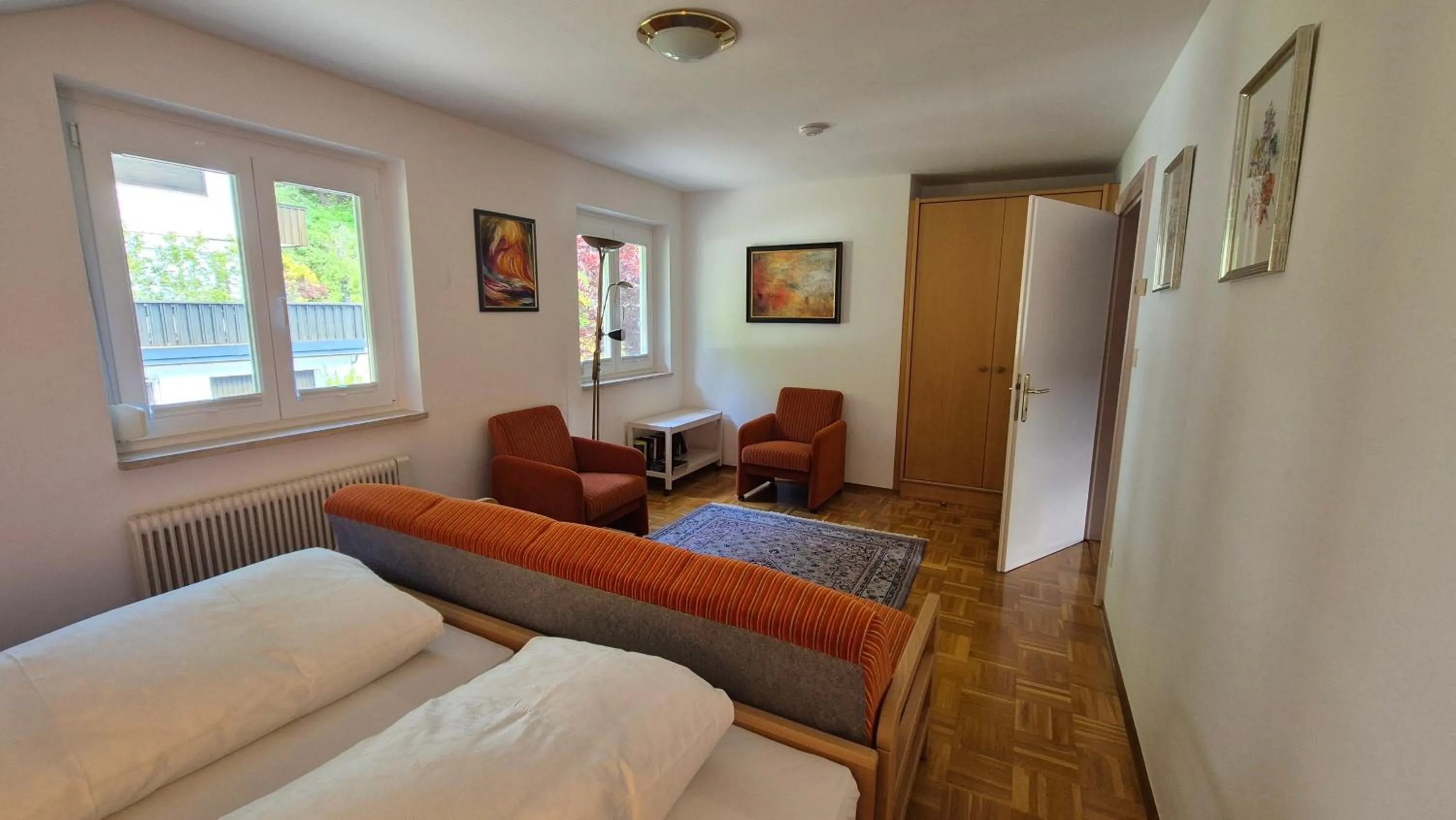 Bed in Haus Kraller-Urlaub mit Seeblick