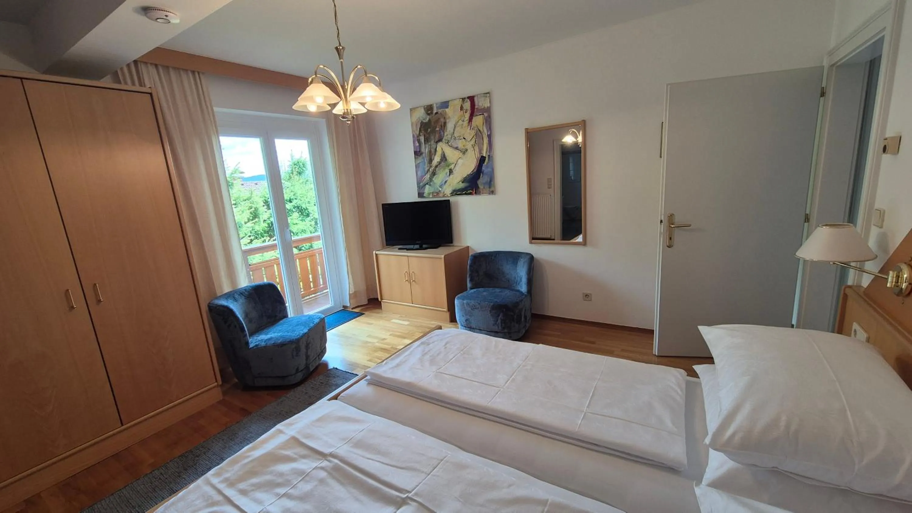 Bed in Haus Kraller-Urlaub mit Seeblick