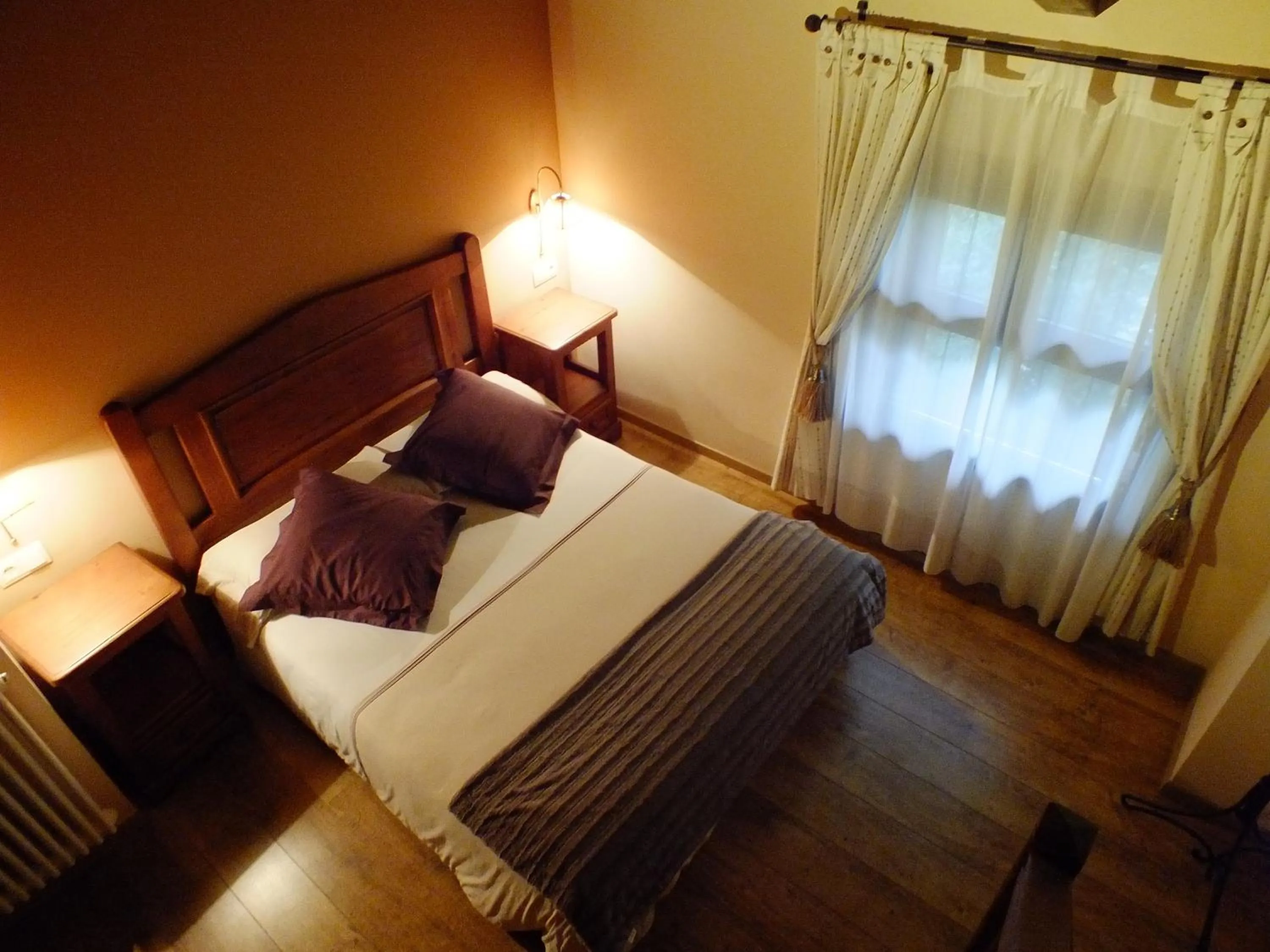 Decorative detail, Bed in Hotel Areulo