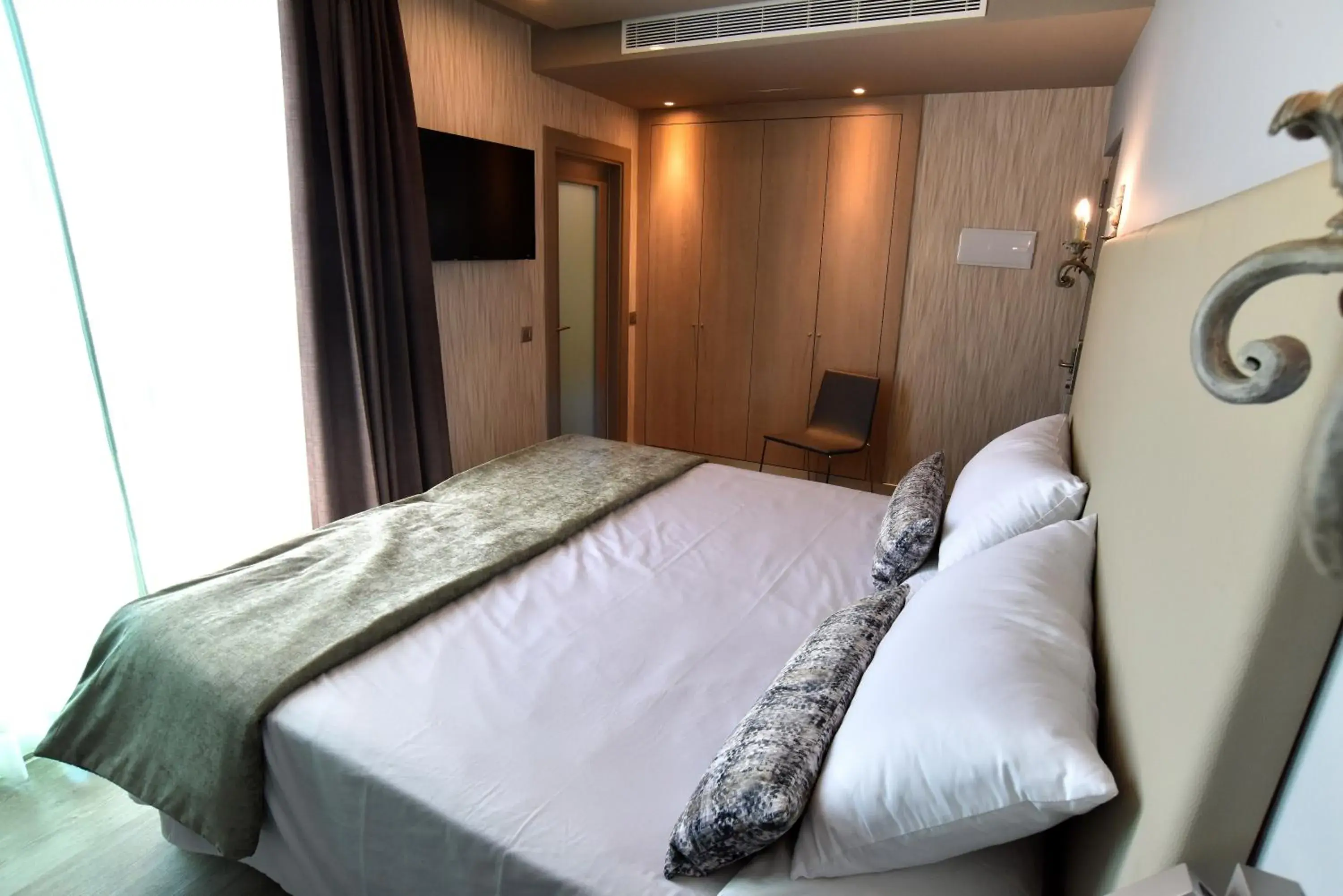 Bed in TC Hotel Doña Luisa Bed in TC Hotel Doña Luisa