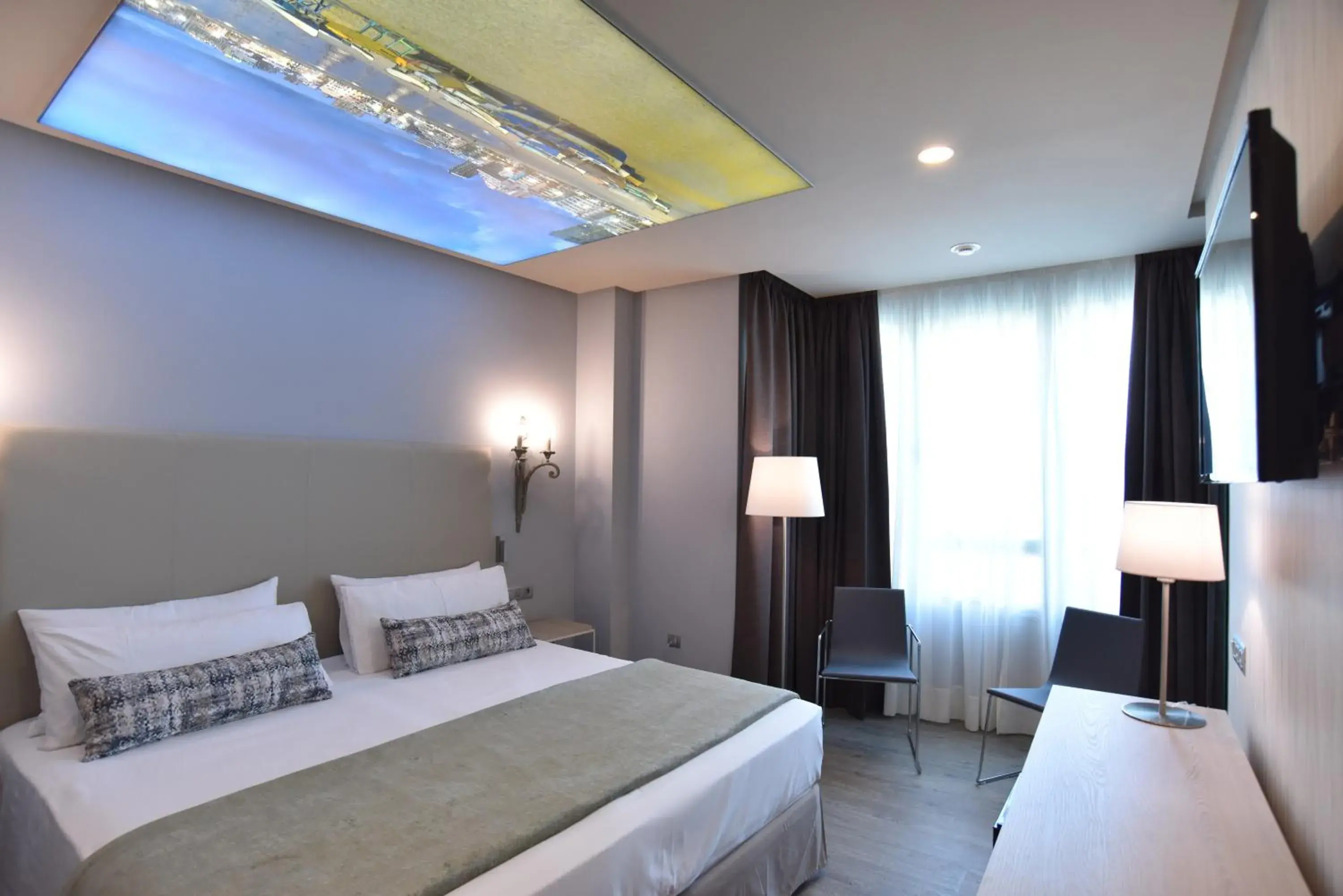 Bed in TC Hotel Doña Luisa Bed in TC Hotel Doña Luisa