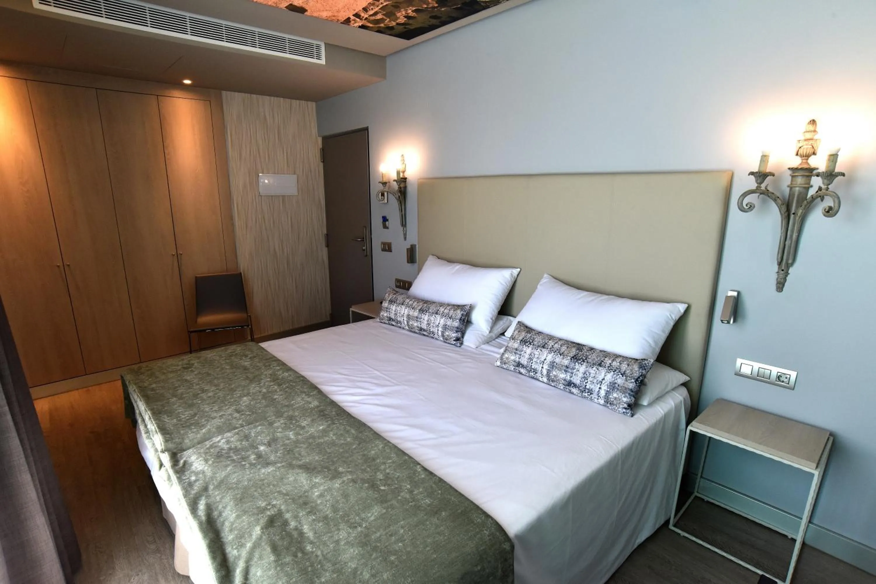 Bed in TC Hotel Doña Luisa