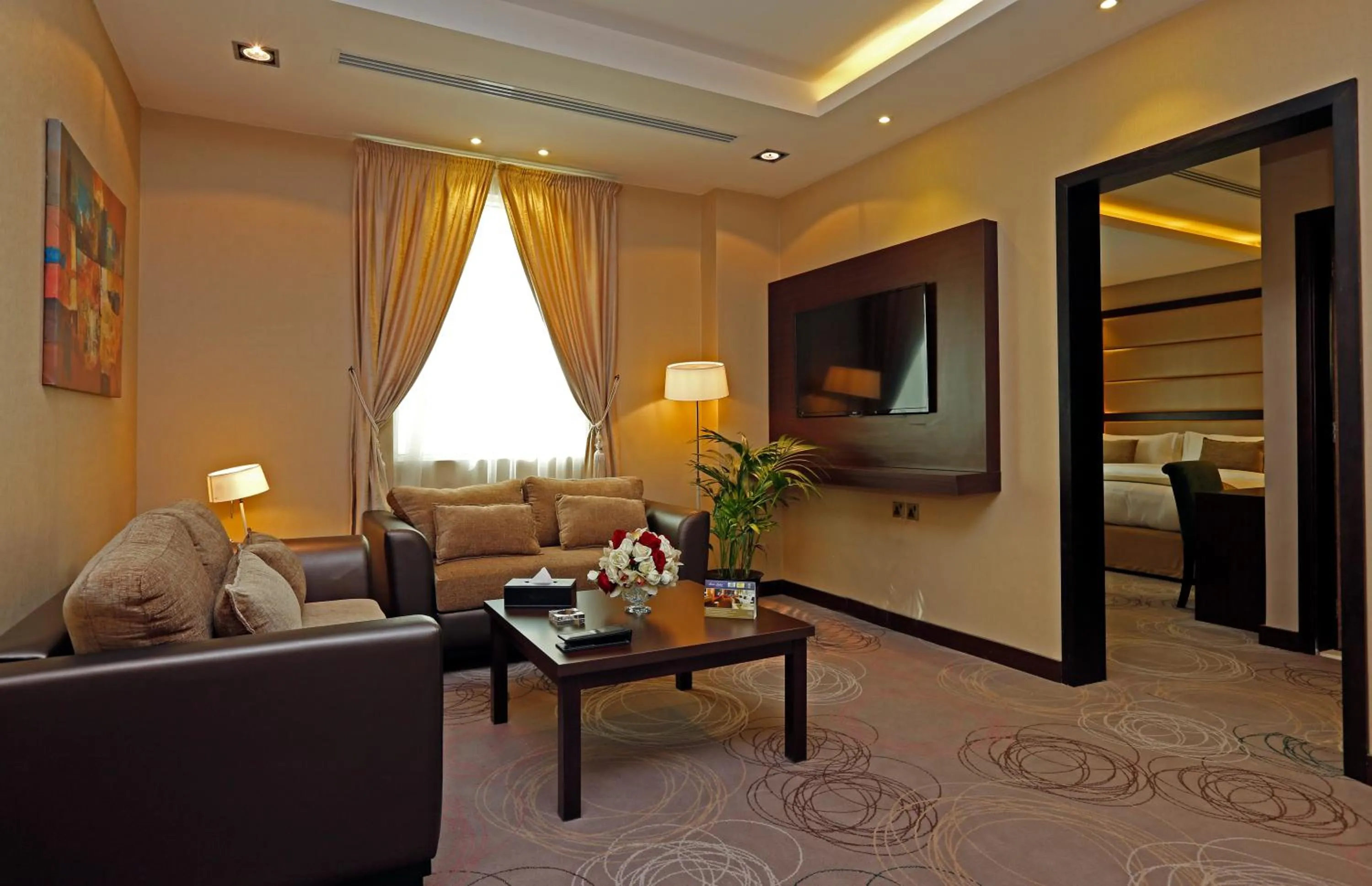 TV and multimedia, Bed in Swiss Flora Inn Hotel Riyadh