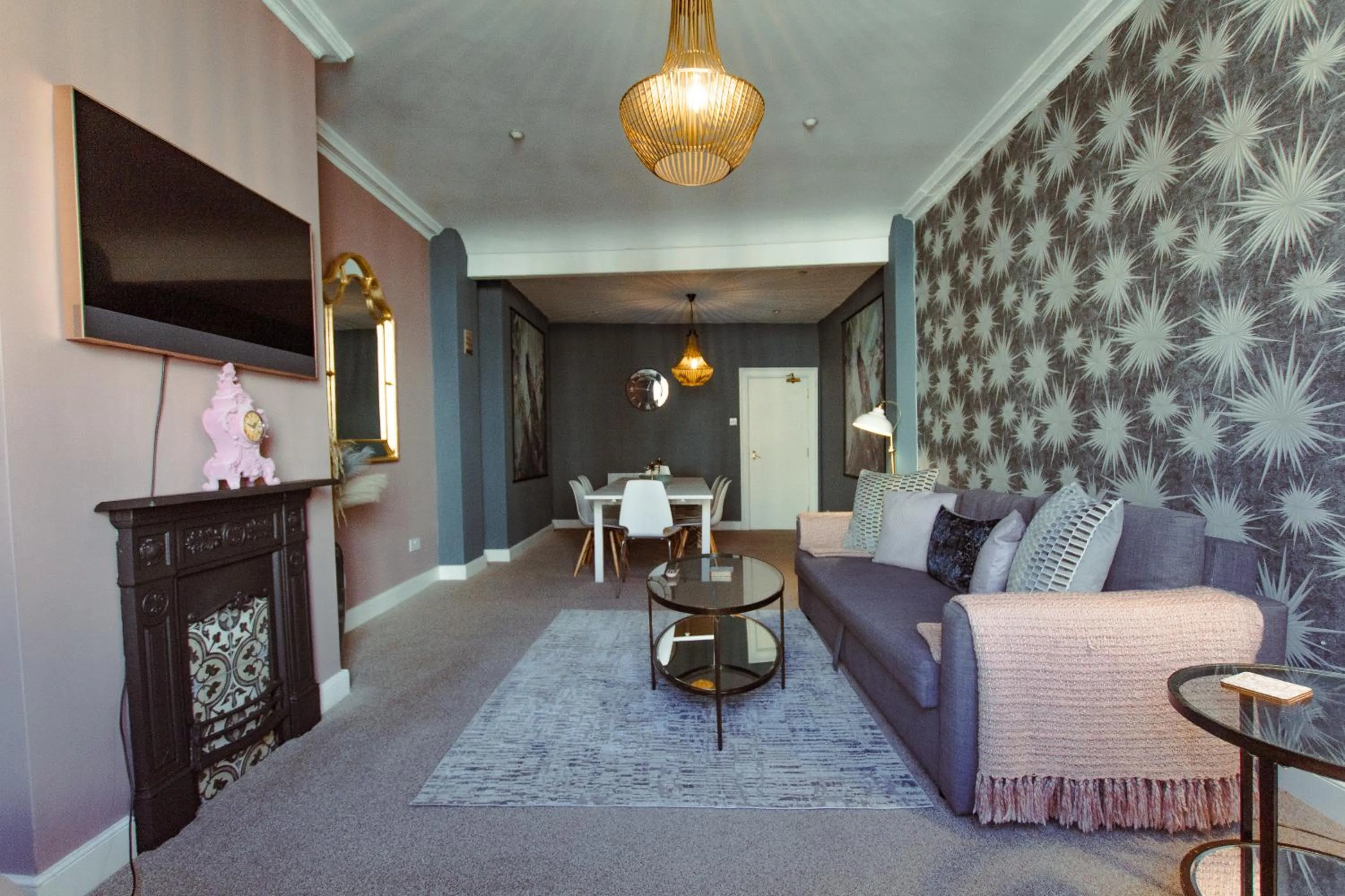 Communal lounge/ TV room in Built 1804 Caldecott Town House On The Rows by Rework Accommodation