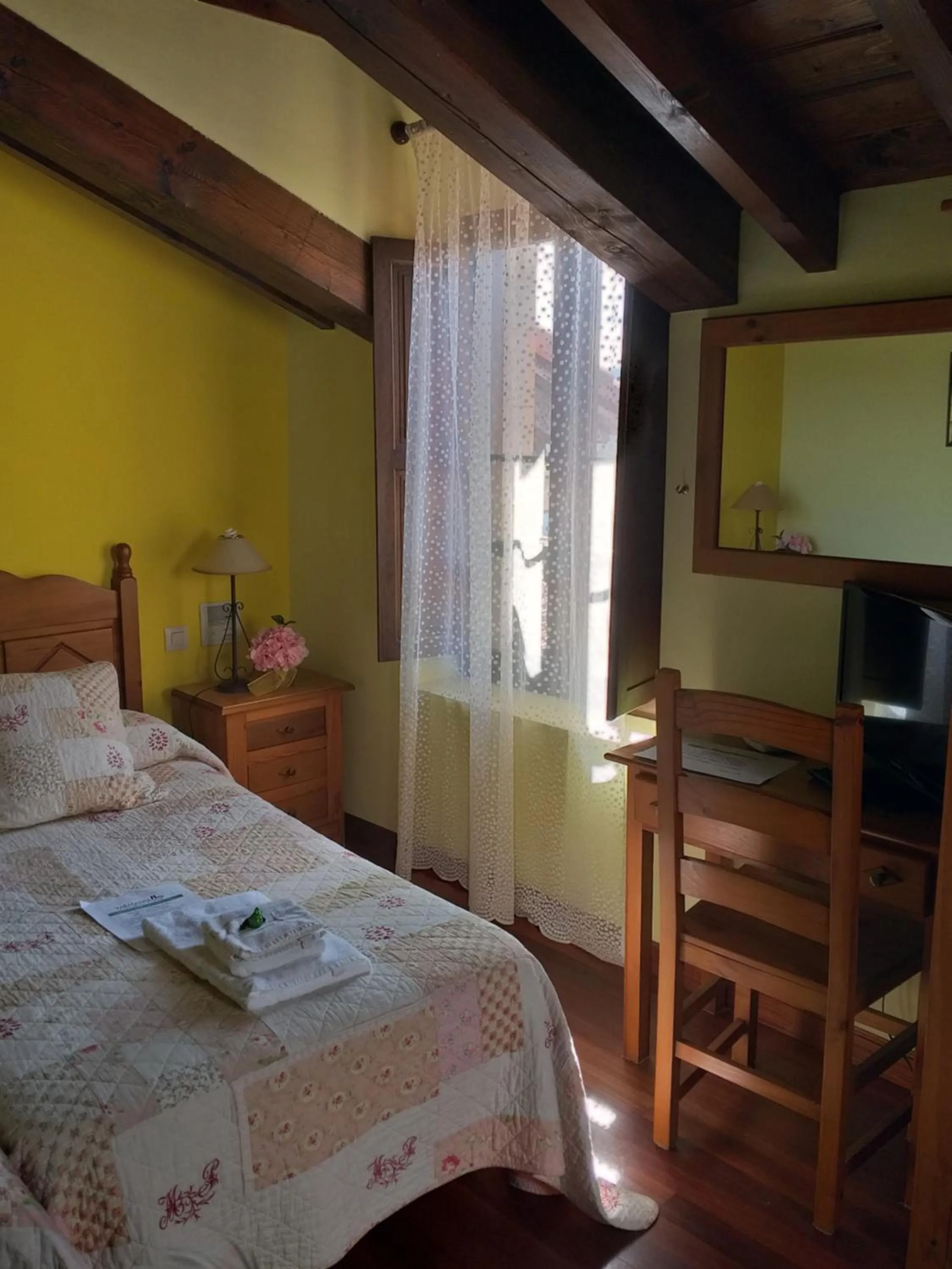 Bed in Posada Rural Entrecomillas